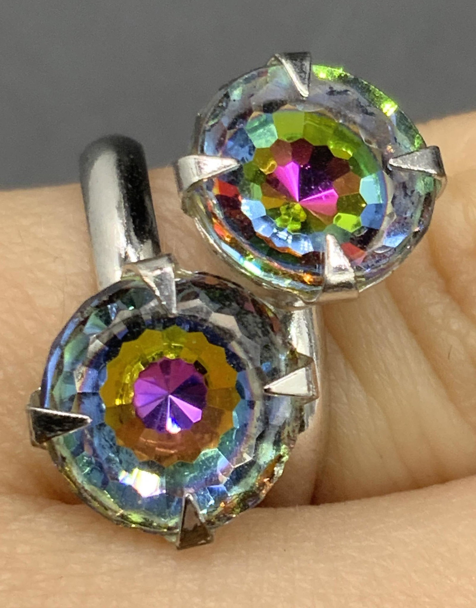 Twin Multicolored Solitaire Crystal Ring, Jewelry: Silver tone metal ring with two twin faceted solitaire crystals. The crystals are multicolored and circular in form. Prong set. Ring size approx 6. Some mild surface wear consistent with use. jewelry,