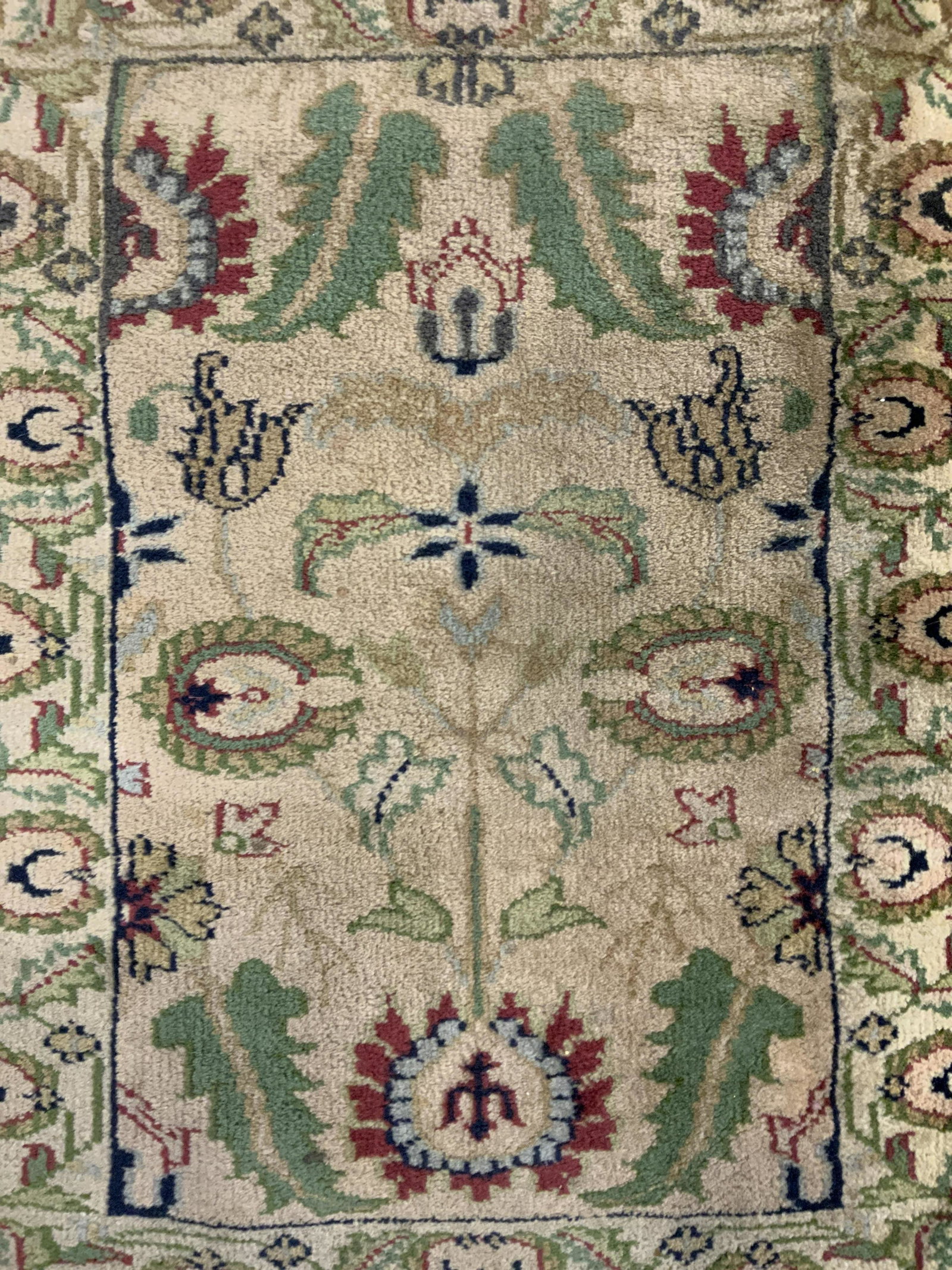 Vintage Handmade Wool Area Rug: Rug is handmade and wool. Piece has multi toned floral, vine & leaf detail. Rug measures approx 37 inches long 28 inches wide. Rug, carpet, vintage rug, area rug, home decor, handmade rug, wool rug. E