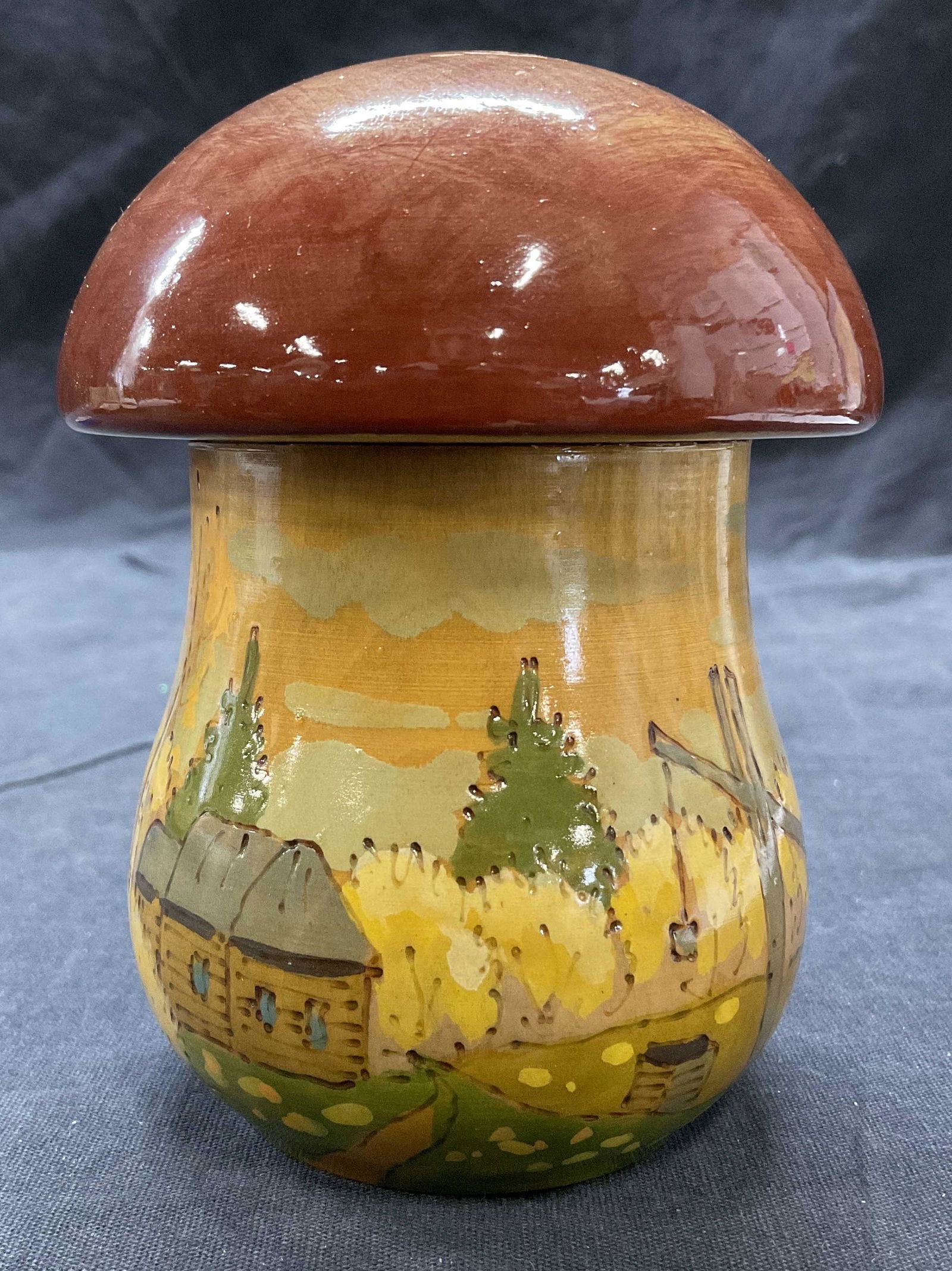 Lacquered Lidded Wooden Mushroom Vessel: Lacquered Lidded Wooden Mushroom Vessel. Measures approx 5 x 3 inches. Landscape Scene to exterior. Lid fits to top. No signature. Lacquered mushroom box, mushroom trinket box, mushroom lacquered vess