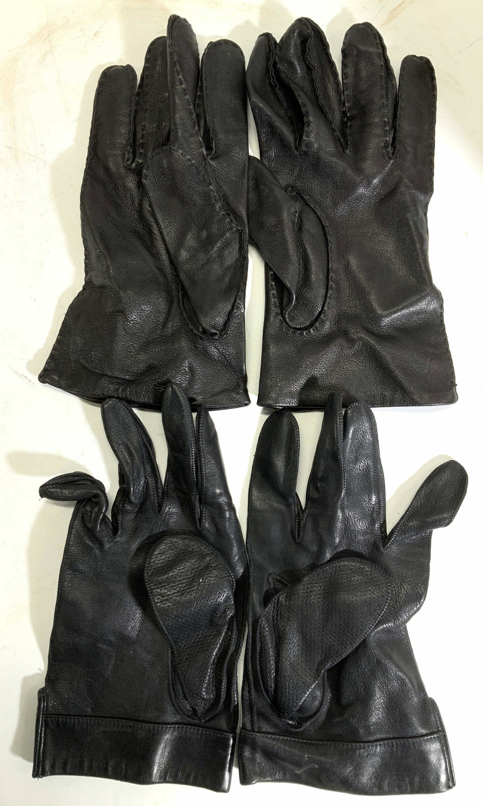 2 Pr Mens Leather Gloves, Chester Jeffries: Mens Black Leather Gloves, gently worn. One pair labeled Chester Jeffries Made In England size 10.5., 2nd pair unlabeled designer, no size. Likely mens size 10.5, black suede interior. Mens wearable a