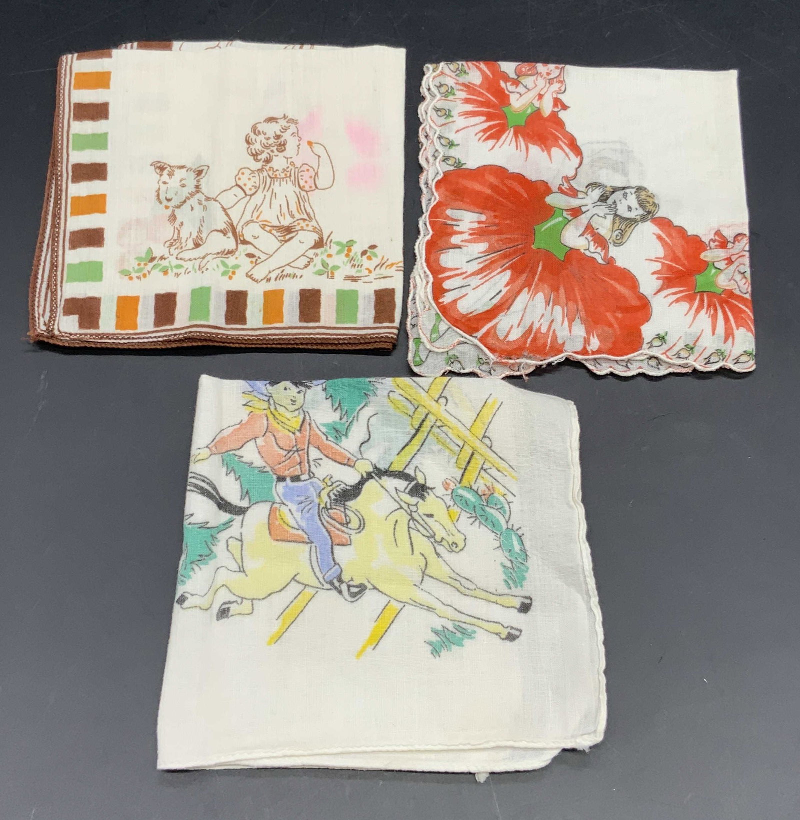 3 Vintage Collectible Handkerchiefs, Animals &More: Three vintage soft hand, rolled edge handkerchief / Hankie featuring people and animals throughout the design. Hankies include one cowboy motif, one dog and child motif (Little Colonel), and one with 