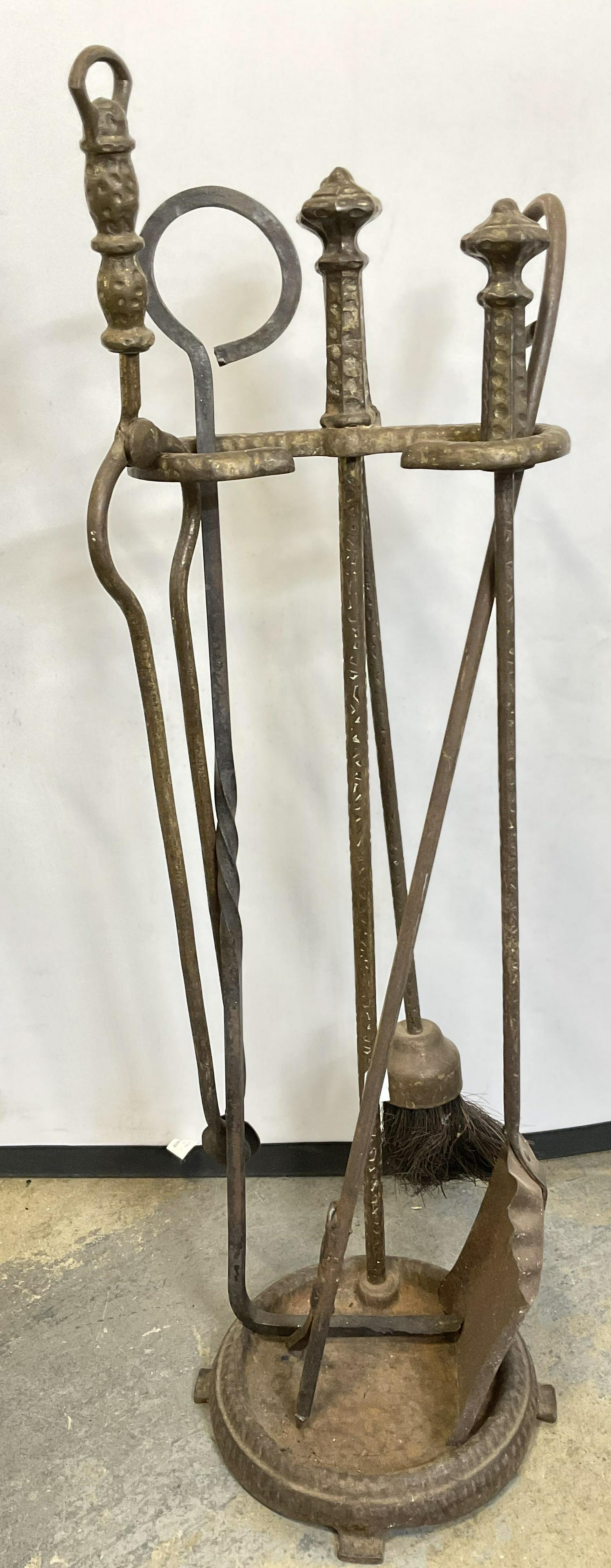 Vintage Iron Fireplace Accessories: Vintage Iron Fireplace Accessories. 5 individual pieces to stand includes 2 pokers (or stoker), tongs, broom and shovel (or pan). Surface wear consistent with age and use of pieces. Measures approx 27