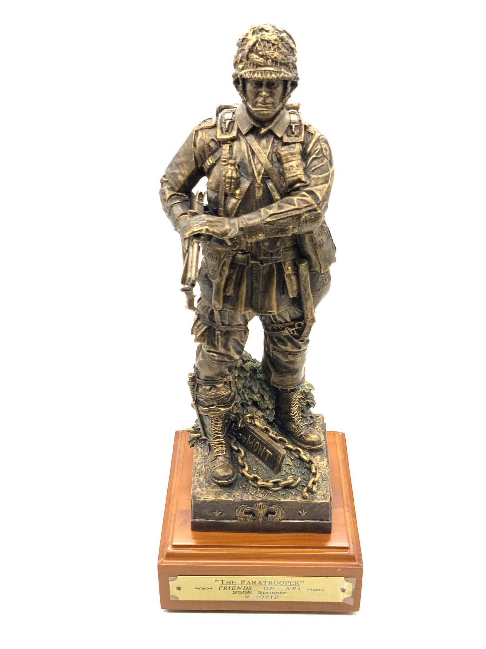 Rick Terry 2006 Friends of NRA THE PARATROOPER: Sculpture depicts a soldier holding his firearm with both hands and looking to the side. 2006 Friends of NRA THE PARATROOPER Sculpture #10712, with a brass name plate on the front. Made out of pewter 