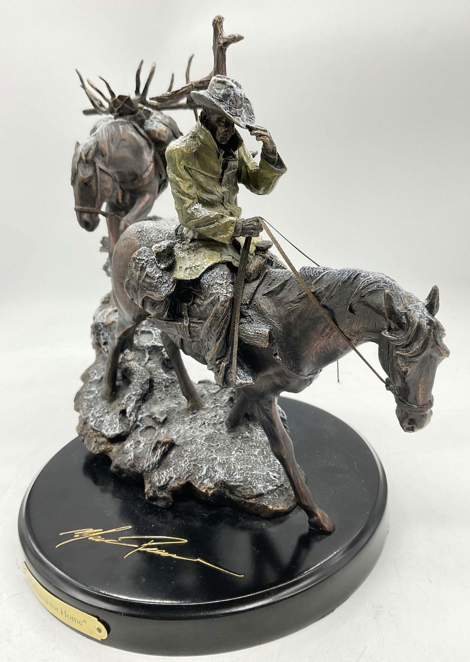 M.Pierce Bronze & Resin Sculpt Headed For Home: Marc Pierce Bronze & Resin Sculpture Headed For Home Big Sky Carvers. Measures approx 12x 17inches long. Sculpture by Marc Pierce from Big Sky Carvers entitled, Headed For Home. It shows a lone man le