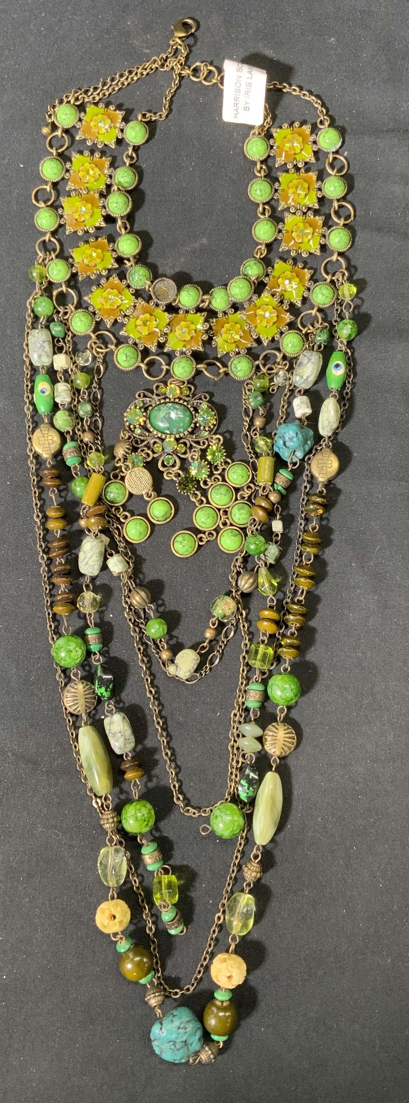 HARRISON SCOTT BY IRIS LANE Chandelier Necklace: Harrison Scott by Iris Lane green bejeweled chandelier necklace with costume crystal, Cabochon, beaded, and enamel decoration. In good condition, one Cabochon needs replacement, measures approx. 19 in