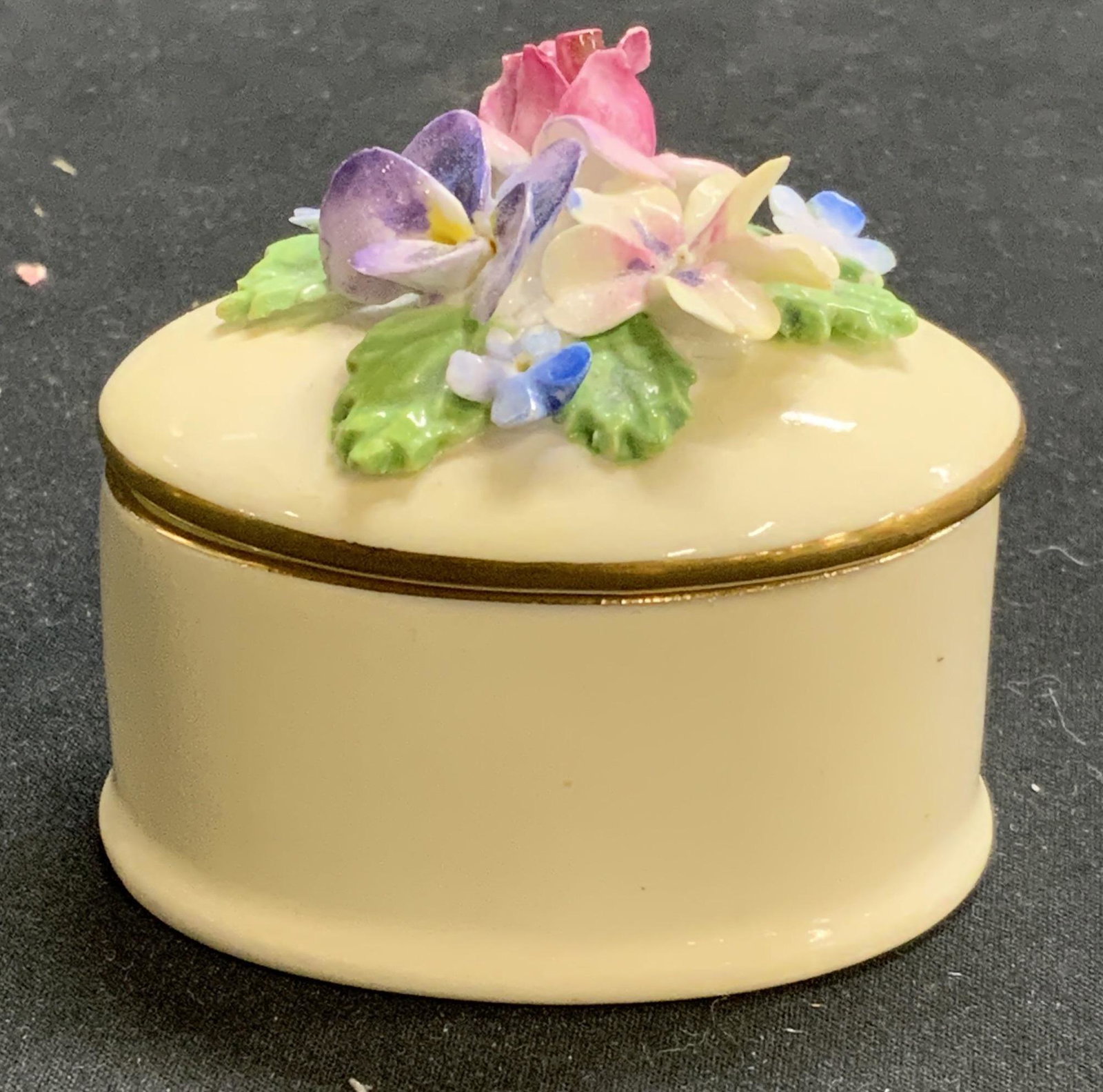 CROWN STAFFORDSHIRE Bone China Floral Pill Box: Crown Staffordshire fine bone china trinket with floral and gilt decoration. Trademarked to underside. Made in England. Measures approx. 2 x 1.5 x 1.5 inches. In good condition. Crown staffordshire, c