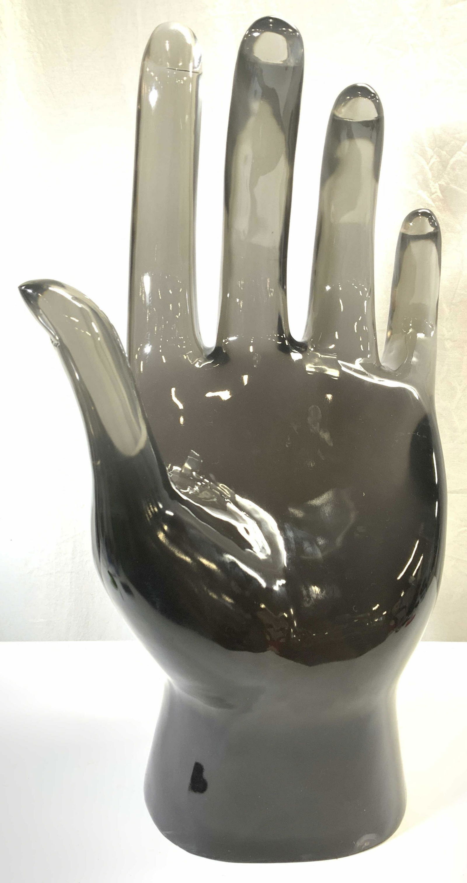 JONATHAN ADLER Grand Acrylic Hand Sculpture: Underside has JA JONATHAN ADLER tag. Sculpture is acrylic and grey toned. Piece has flowing shapes to fingers. Sculpture measures approx 25.75 inches tall 15 inches wide 10.5 inches deep. Potter, desi