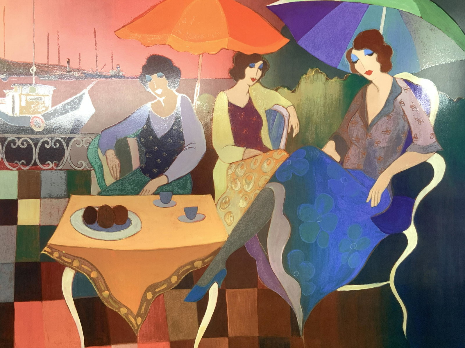 TARKAY Gulf Coast Breeze Silk Screen: Marked on right corner TARKAY Subject depicts a silk screen of Tarkays Gulf Coast Breeze, 3 ladies sitting amongst a table with boats on the ocean water in the background. Approximately 23 x 19 inches