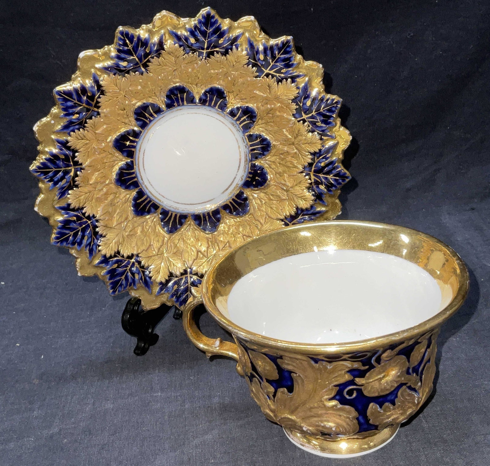 Meissen Hallmarked Gilt Teacup & Saucer: Meissen Hallmarked Gilt Teacup & Saucer. Measures approx 6 x 3 inches. Some minimal wear to surface of piece and to gilt surface. Hall mark to obverse of teacup and saucer. Meissen, Meissen porcelain,