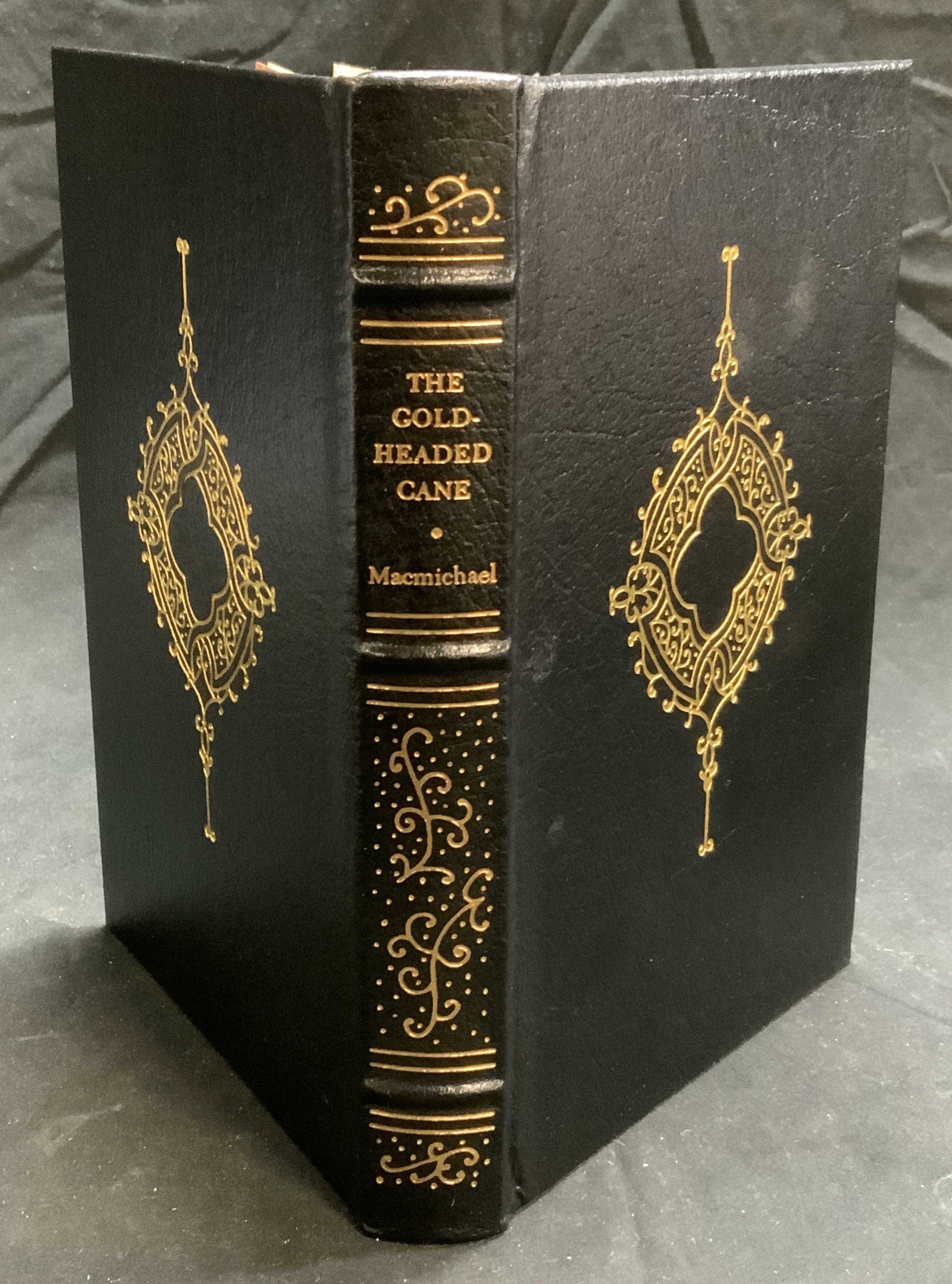 Special Edition The Gold Headed Cane, Macmichael: Special edition copy of The Gold Headed Cane by William Macmichael, M.D. hardbound in leather with gilt decoration. Facsimile of a 1915 edition. Published by Gryphon Editions, 1993. Measures approx, 5