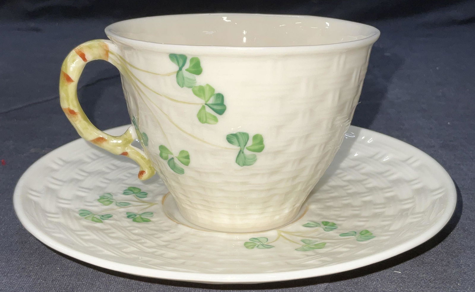 BELLEEK Ireland Tea Cup & Saucer: BELLEEK Ireland Tea Cup & Saucer. Labeled to obverse to both teacup & saucer Beleek Ireland. No chips or damage to piece. Saucer Measures 6 inches across, teacup measures approx 4.25 x 2.75 inches. Ha