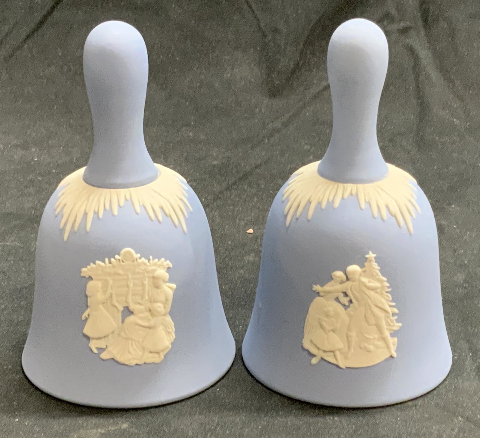 Pair WEDGWOOD 1997/99 Blue Holiday Bells: Pair of Wedgwood 1997 and 1999 holiday blue Jasperware bells. Trademarked to reverse. In good condition. Measure approx. 2.5 inches diameter and 4.25 inches tall. Wedgwood, Wedgwood bell, vintage Wedg