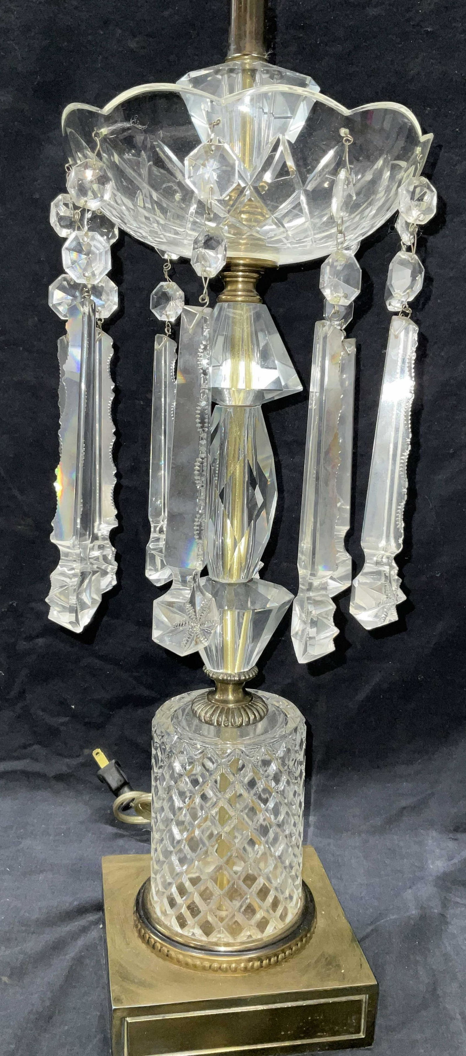 Cut Glass Luster Mid Century Lamp: Cut Glass Luster Mid Century Lamp. Measures approx 36H x 7W inches. Brass base. No shade, no bulb, NOT tested for functionality. Surface wear to piece consists of minor chipping to glass throughout (s