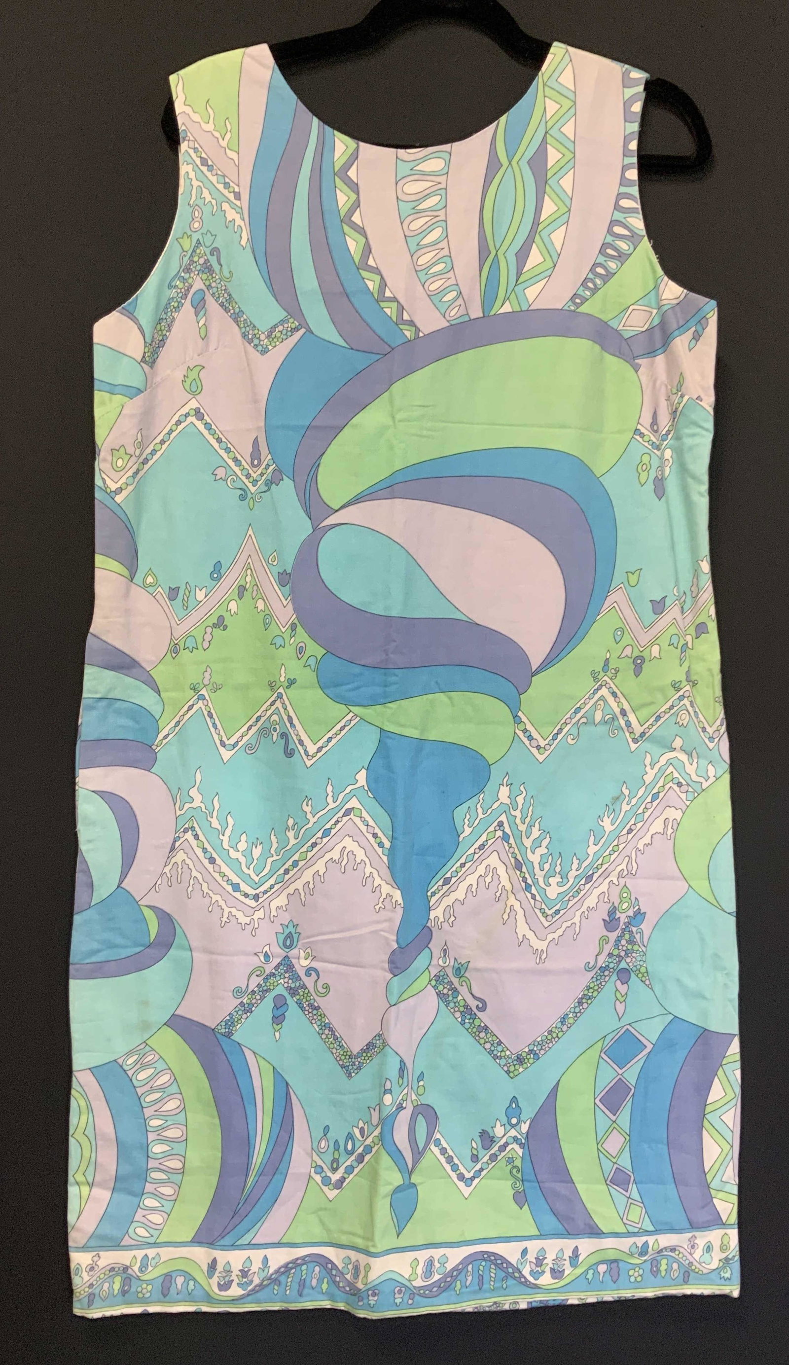 Pucci Style Vintage Cotton Shift Dress: Hand made vintage sleeveless dress with fabric in the style of Emilio Pucci. Backside zipper and hook, waist 40 in. Length app 38 in. Has a side hand pocket. Soft cotton fabric, pastel colors of green