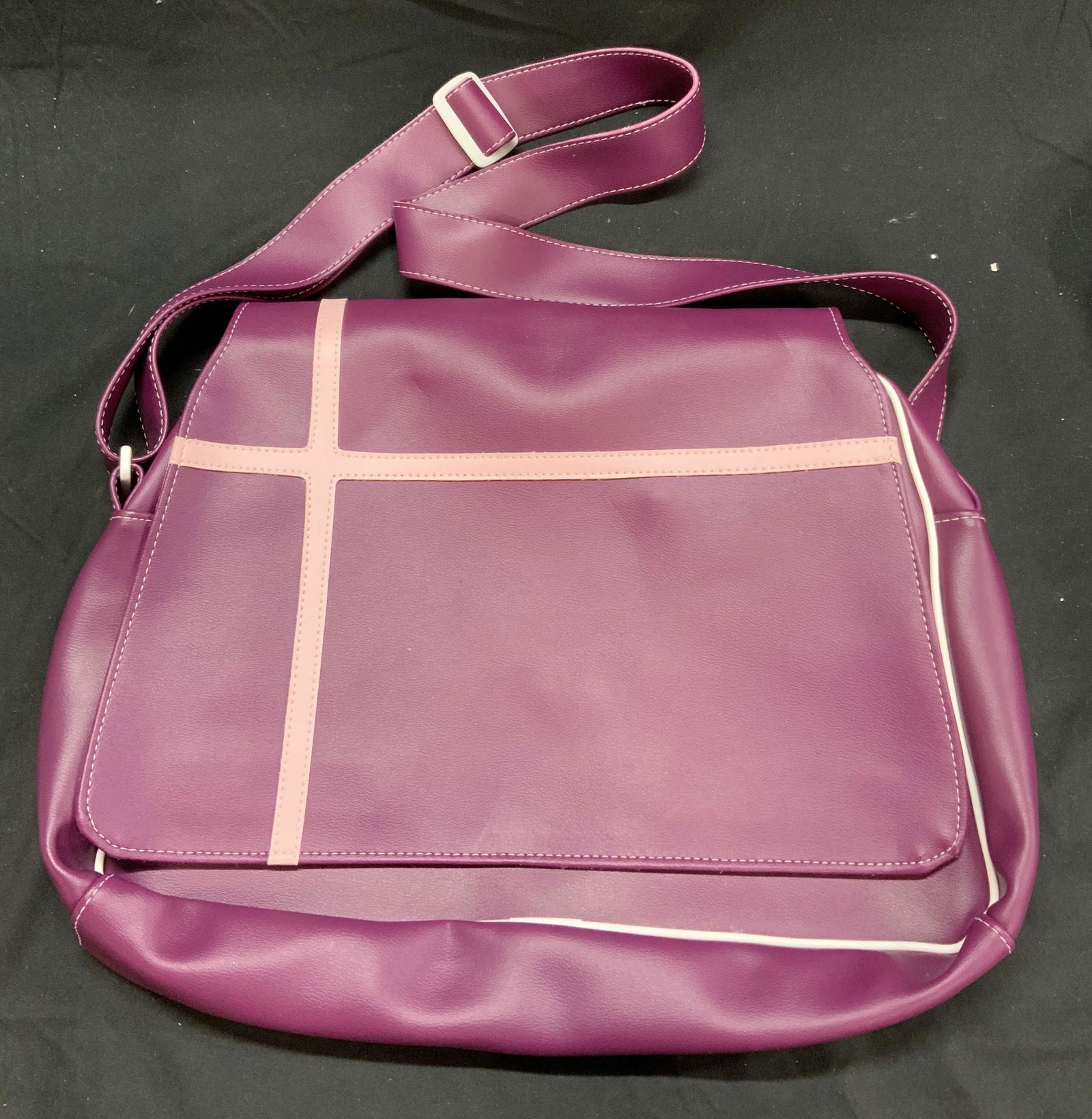 Vtg PAUL FRANK Purple Messenger Bag New: Paul Frank purple messenger bag. Handbag is new without tag, vintage old stock. Fold over flap with Velcro and zipper closure. Measures approx. 15 x 3.5 x 11.5 inches. Strap drop approx. 13.5 inches,