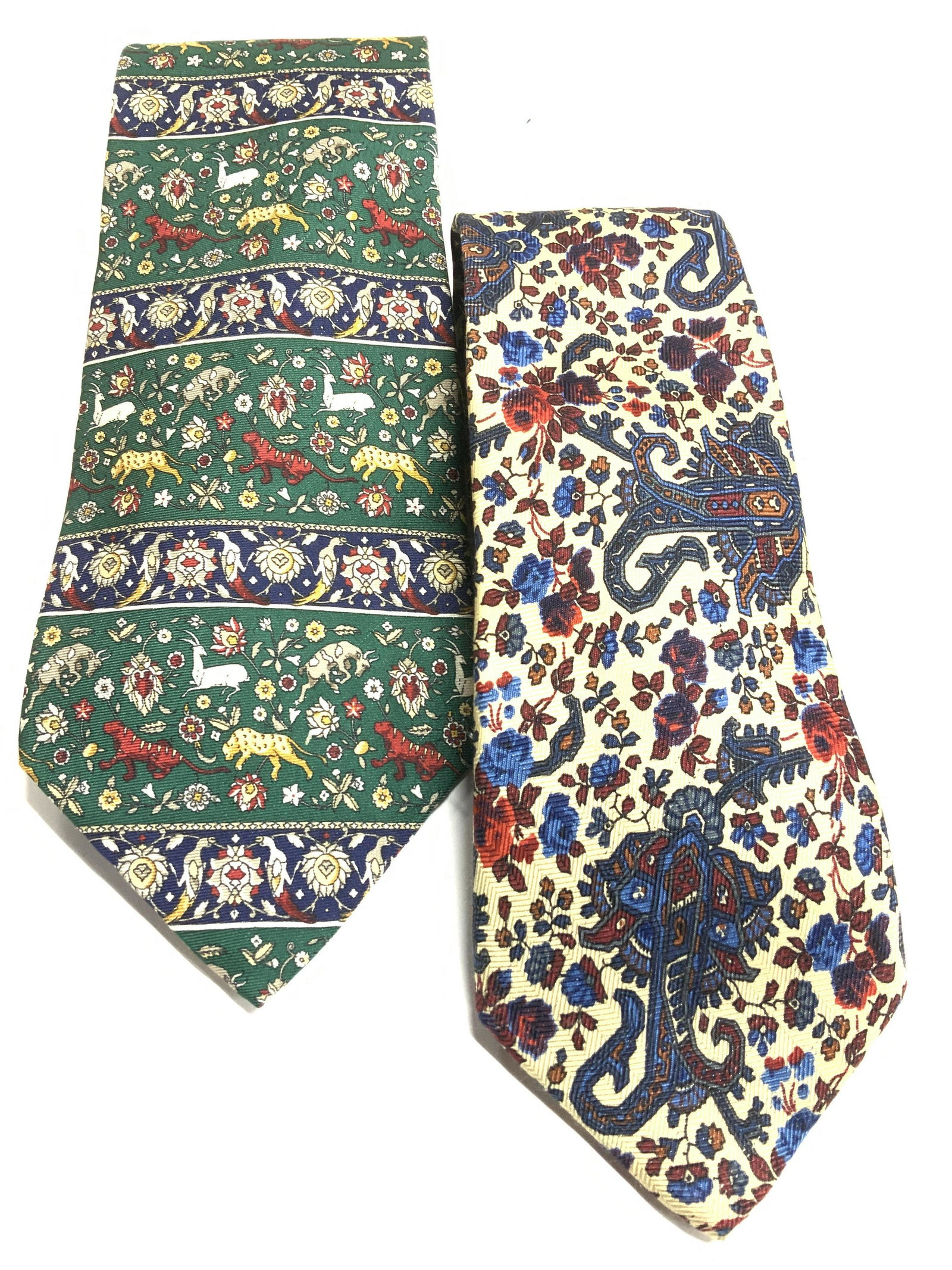 ETRO, MMA Victorian & Middle Ages Print Silk Ties: ETRO cream silk tie with Victorian roses and scrollwork in colors of blue, brick red and orange. Made in USA, 3.25 x 57.5 in. Small patch of wear to silk The Metropolitan Museum of Art Mythical creatu