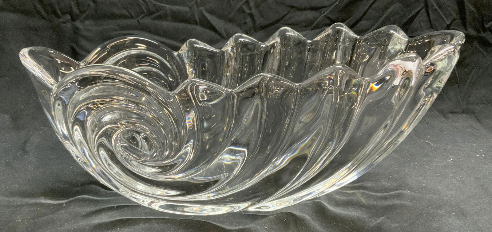 Crystal Shell Form Bowl: Crystal shell form bowl. Piece has weight. In good condition. Measures approx. 14 x 7 x 5.75 inches. Crystal bowl Crystalware, shell bowl, table decor, table accessories, centerpiece bowl, centerpiece
