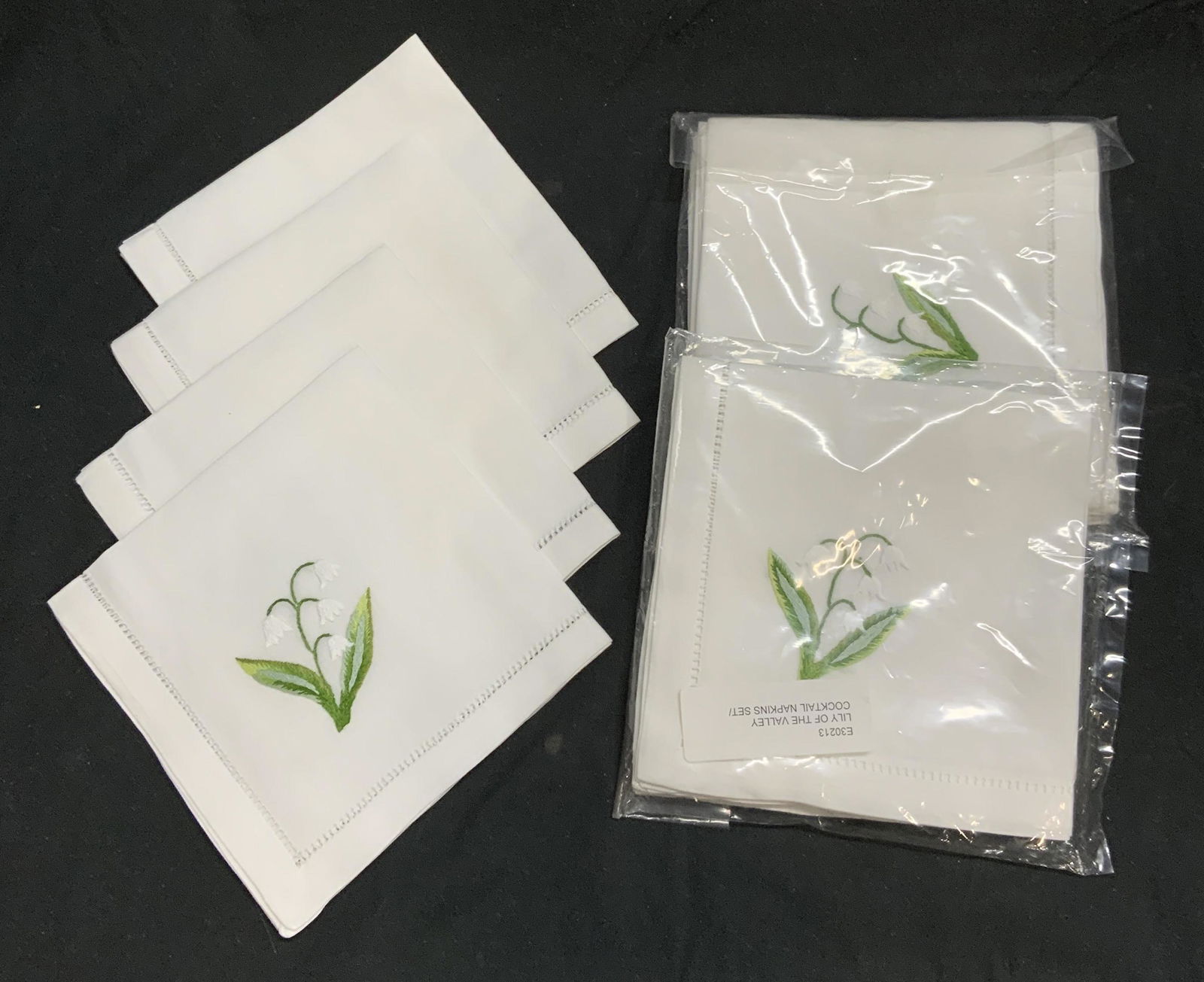 Set 14 PERRIER Lily Cocktail Napkins NIP: Set of 14+The Source Perrier Collection Lily of the valley cocktail napkins. 100% cotton. New in package. Measures approx. 12 x 12 inches each. The source Perrier collection, cocktail napkins, Lily co