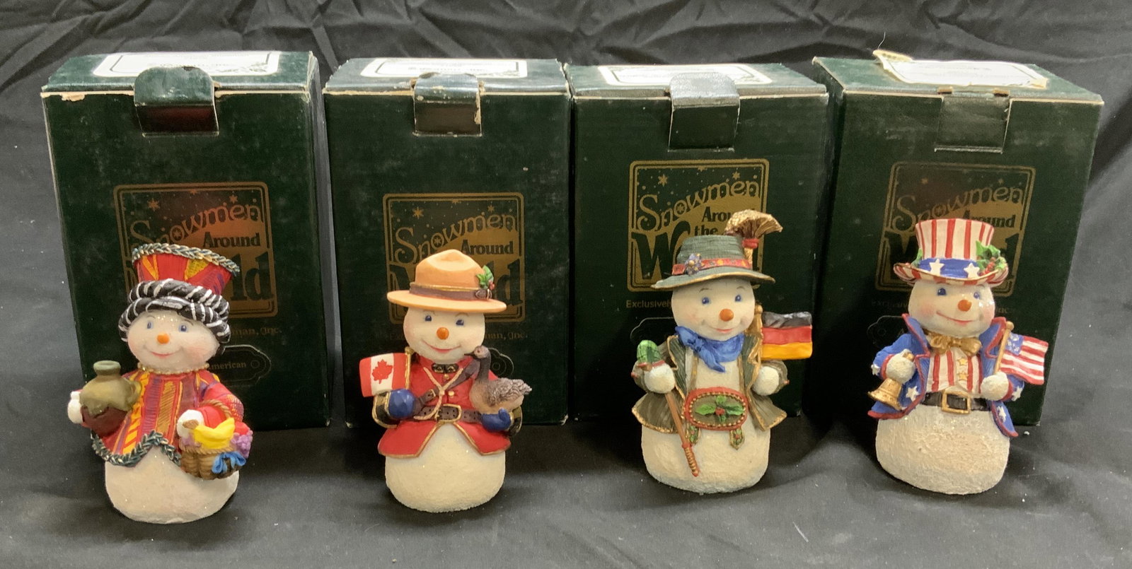 Set 4 Snowmen Around The World Figurines (1 of 4)