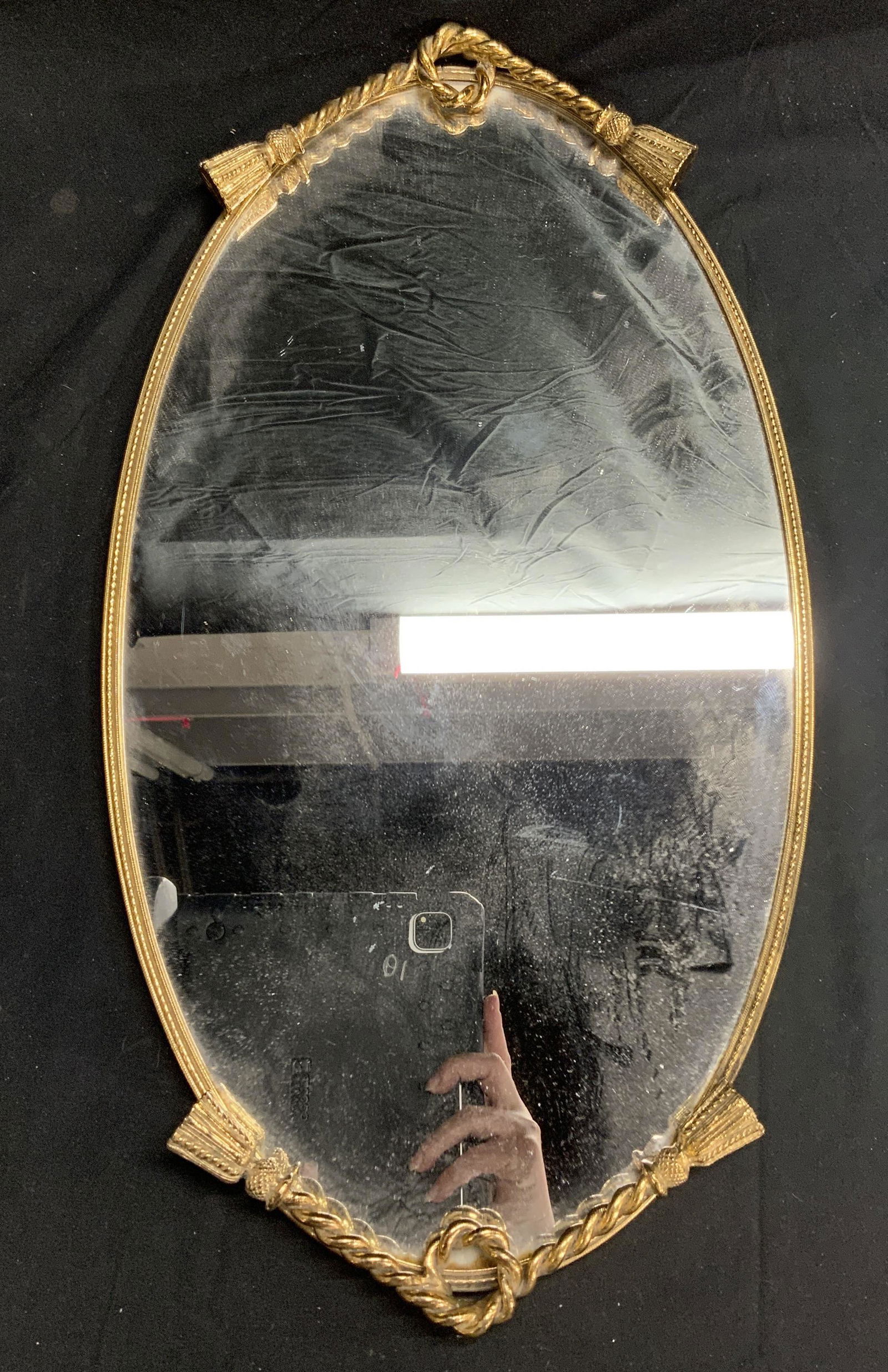 Gold Tone Mirrored Tray with Rope Motif: Gold tone mirrored tray with rope motif to rim. Measures approx. 10 x 18 inches. Some surface wear consistent with exposure. Mirrored tray, gold tone mirror, mirror, table decor, table accessories, ho
