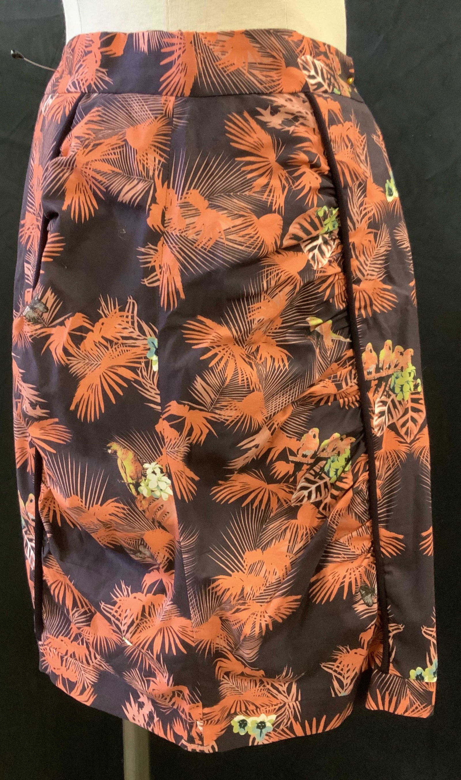 MISSONI Tropical Print Skirt, Italy: MISSONI cotton and spandex skirt. Bright coral tropical fauna with parrots. A slight ruching along the linear trim. 26 in waist, 21 in. L backside zipper. Luxury Designer wear, Missoni skirt, Made in