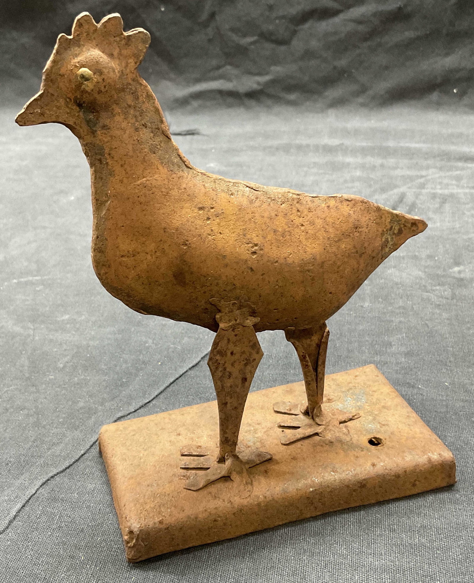 Antique Metal Chicken Folk Art Figural: Measures approx 4.25 x 2.25 x 6 inches. Piece is rusted. Could have been used as a topper for something, holes to base of piece, Chicken figural, metal chicken figural, up cycle sculpture, up cycle ar