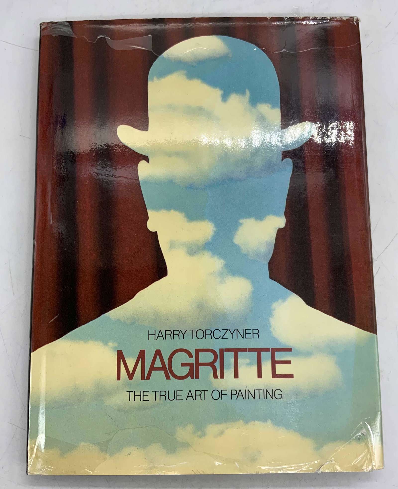 Magritte The True Art of Painting, Book: Hardcover copy of Magritte: The True Art of Painting by Harry Torczyner. Published by Harry N. Abrams, 1985. Wear to book jacket, cover, pages, and spine consistent with exposure. Measures approx. 9 x