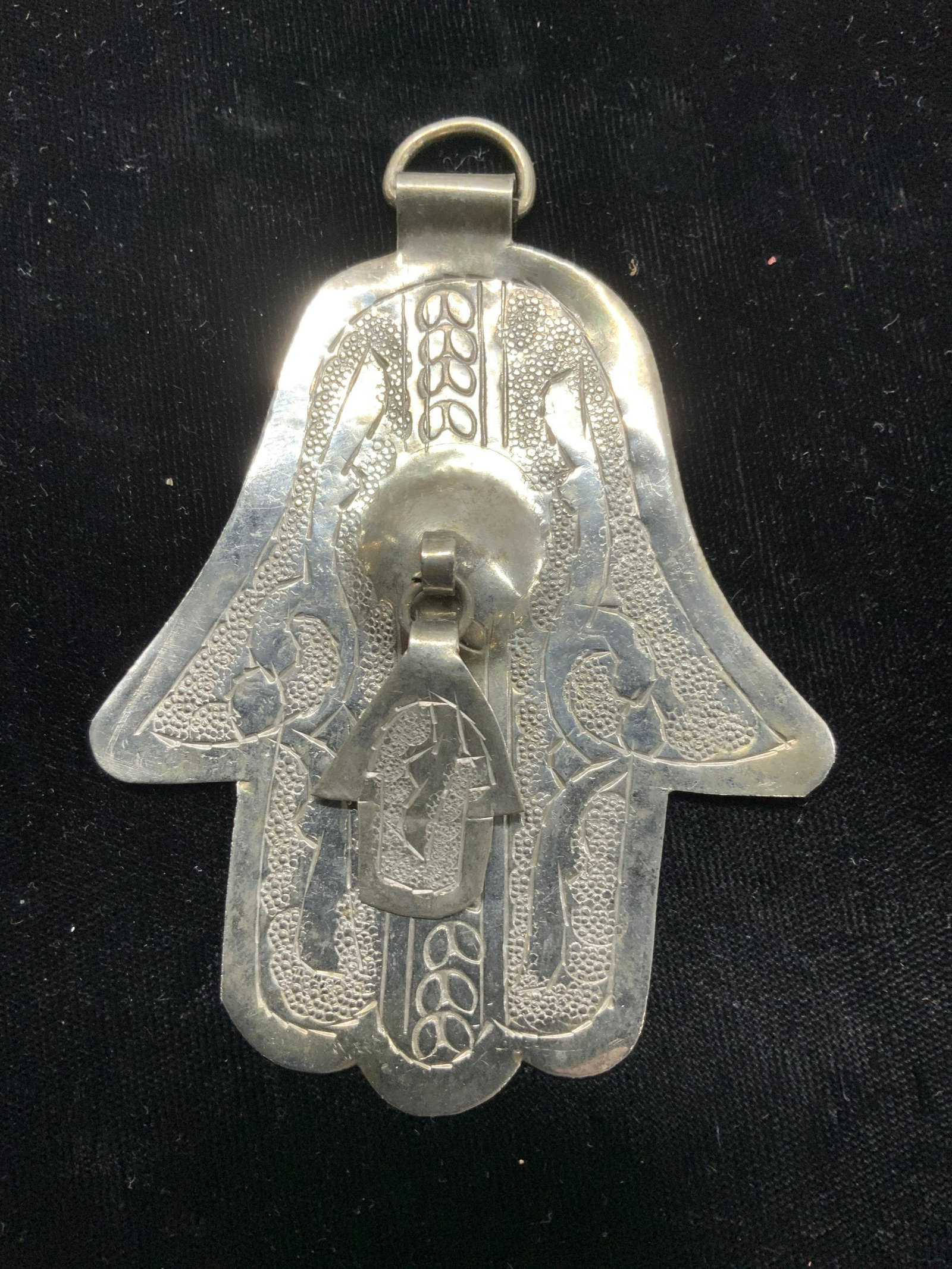Vintage Etched Tin Hamsa Ornament Accessory: Large Etched Ton Hamsa, 4 x 2.5 in. Has a D ring bale for handing or use as a pendant. Hand Crafted. Vintage piece, has surface wear. Vintage Hamsa accessory, Vintage Jewelry, Up cycle jewelry, Arts a