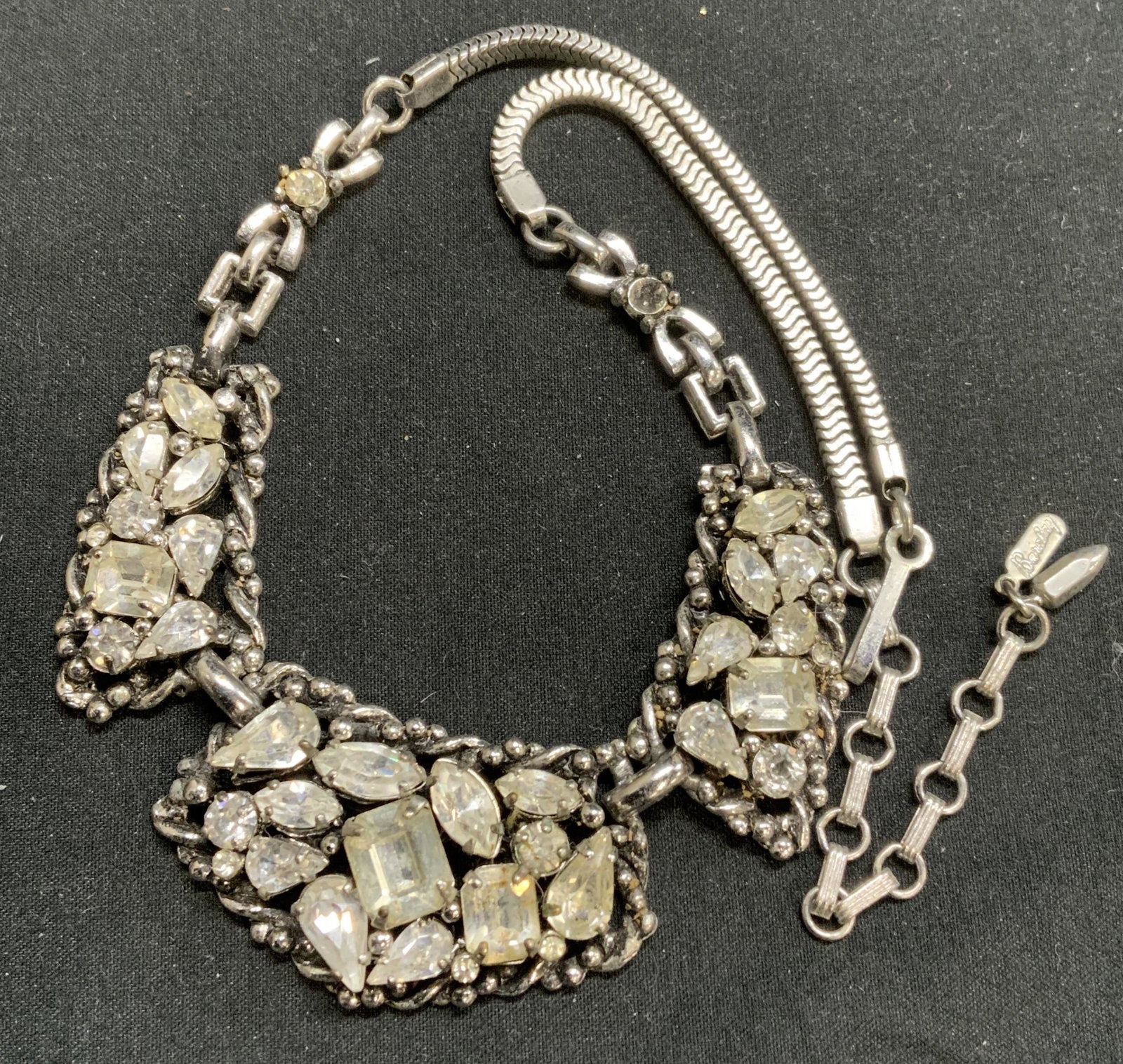 BARCLAY Crystal Choker Necklace, Jewelry: BARCLAY silver tone choker necklace with crystal decoration. Designer label to charm. Measures approx. 17 inches. Some surface wear consistent with exposure. Estate jewelry, costume jewelry, cocktail 