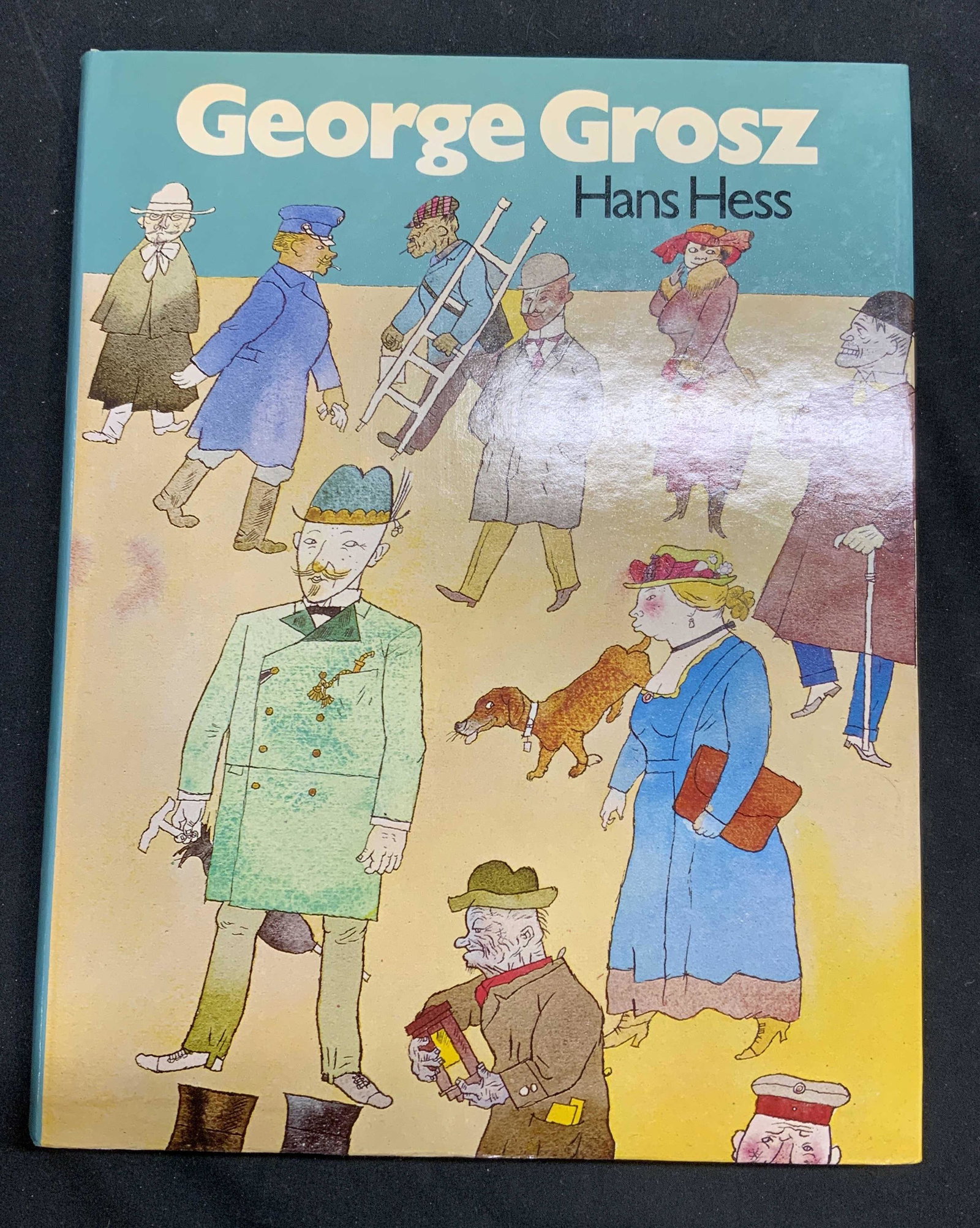 GEORGE GROSZ Art Book By Hans Hess: Hardcover copy of George Grosz by Hans Hess. Published by Macmillan, 1974. Some wear to book jacket, cover, pages, and spine consistent with exposure. Measures approx. 8.75 x 11 inches. George grosz, 