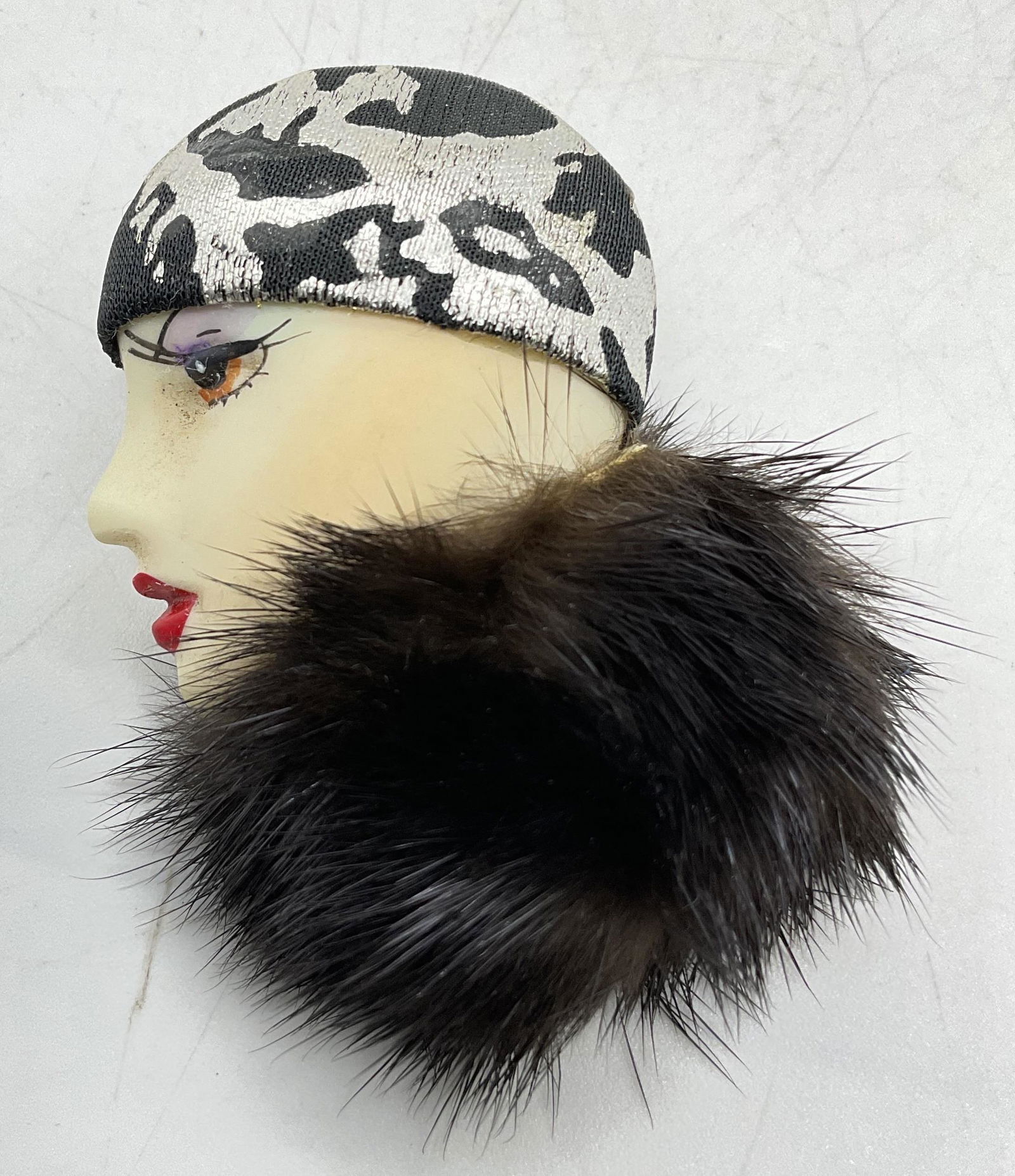 Flapper Profile, W Mink Fur, Statement Brooch.: Flapper Figural, W Mink Fur, Statement Brooch. Measures approx 2 x 1.5 inches. Collar of brooch is possibly mink fur, feel like mink fur. Minimal wear to piece consistent with age and use. 1920s style