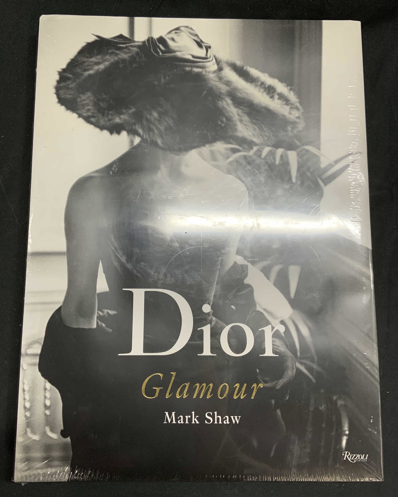 Dior Glamour Fashion Book New in Package: Hardcover copy of Dior Glamour: 1952-1962 by Mark Shaw. New in sealed package. Published by Rizzoli, 2013. Measures approx. 10.5 x 14.25 inches. Dior, Dior book, Dior glamour, fashion book, photograph