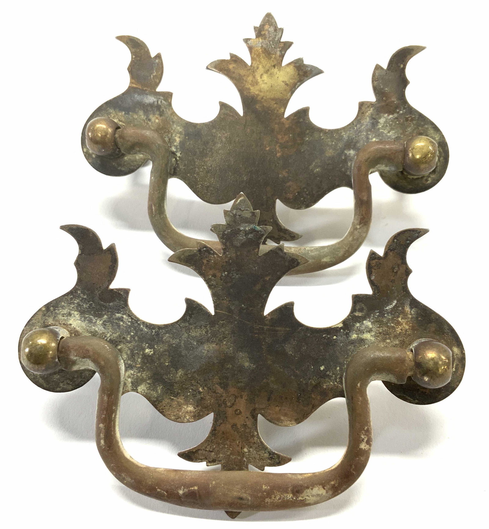 Pair Vintage Brass Victorian Furniture Handles: Vintage brass drawer handles, furniture handles, box handles. Comes with screws. Discoloration consistent with age and exposure. 3.5 x 2.75 in L x Ht. Screws are 3 in. apart. Victorian Furniture Pulls