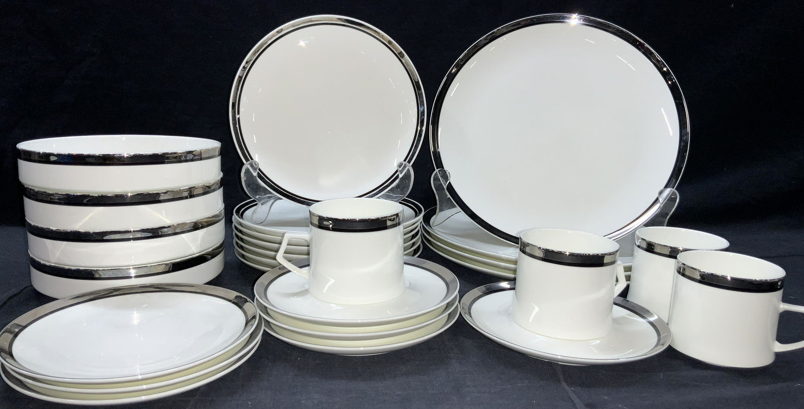 Set 22 MIKASA Fine Bone China Partial Dinning Set: Marked MIKASA, bone China, made in Japan. Solitude pattern. All white base with black and silver toned bands on rims. 4 dinner plates, 10.5 inch diameter 7 salad plates, 7.5 inch diameter 3 bread plat