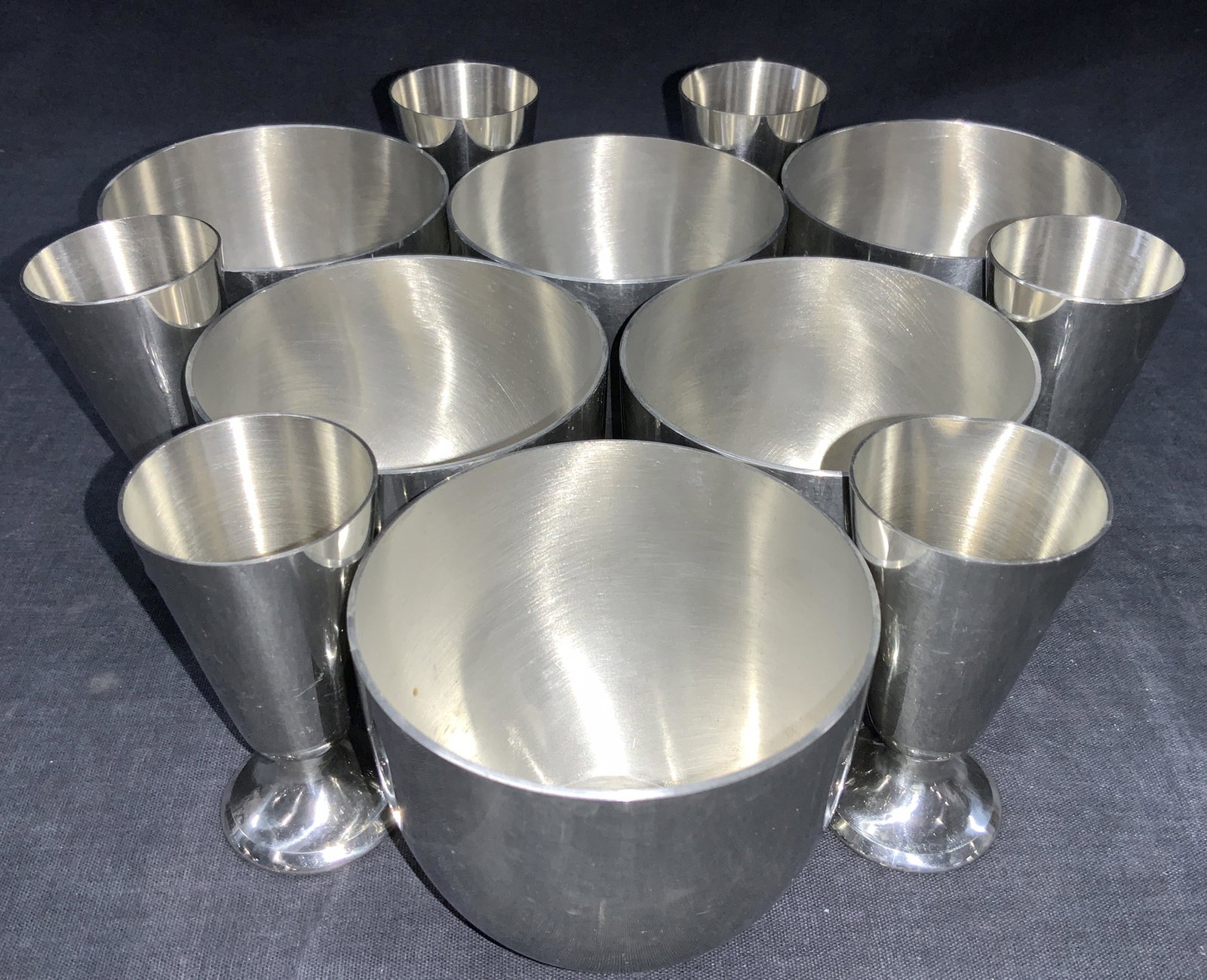 Lot 12 STIEFF PEWTER Drinkware: 12 Stieff Pewter cups. 6 Jefferson cups, marked on underside Stieff Pewter P50. Approximately 2.75 inches tall 6 Cordial cups, marked Stieff pewter on undersides, approximately 3 inches tall. Minor we
