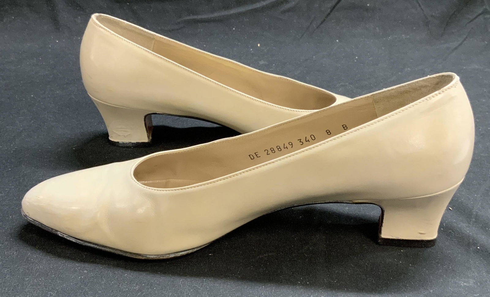 FERRAGAMO Cream Leather Pumps: FERRAGAMO cream leather pumps. Size 8. Heel height 1 3/4 inches. Wear to leather and soles consistent with exposure. FERRAGAMO, FERRAGAMO pumps, FERRAGAMO accessories, ladies designer heels, ladies de