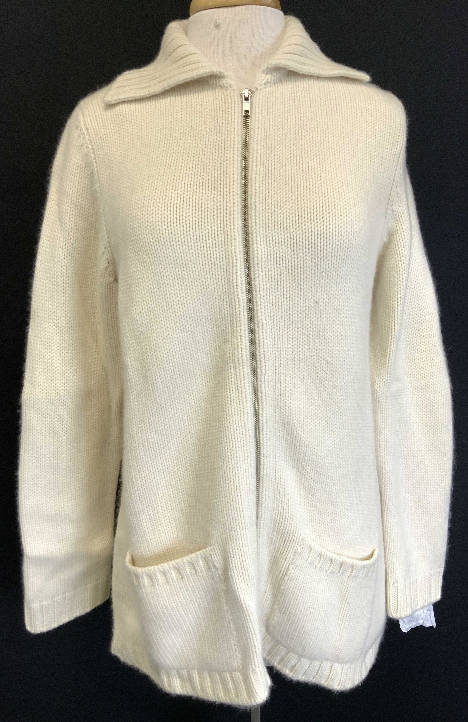 ZANONE Bergdorf Goodman Cashmere Zip Up: Antique white toned zip up sweater with front pockets and high collar Marked ZANONE, Bergdorf Goodman, 100% Cashmere. Sleeve length is approximately 25 inches Torso being 32 inches around. ZANONE cash