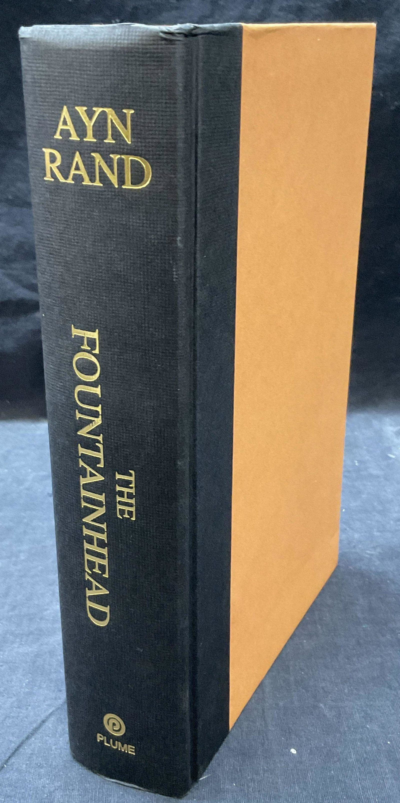 Ayn Rand The Fountainhead, CR 1943 Book: Hardcover Book of The Fountainhead, CR 1943. Written by Ayn Rand. Measures approx 6.25x 9.25x 1.75 inches. No dust cover to piece. No visible wear to piece. Published in NY Hard cover book, The Founta