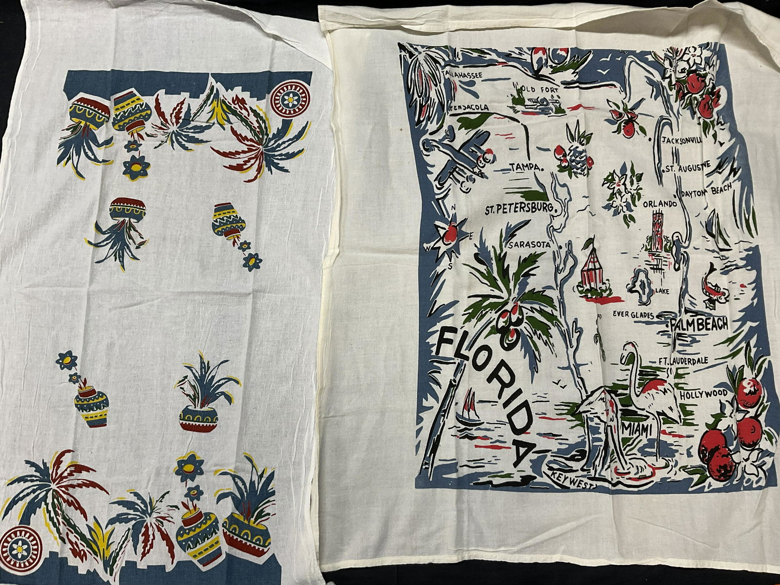 Lot 2 Kitchen Tea Towels, Florida Theme & More: Lot 2 Kitchen Tea Towels. Largest measures approx 27 x 28.5 inches. Florida themed tea towel, and a floral detail tea towel. Some stains to pieces (see photos). No material labels to pieces, soft hand