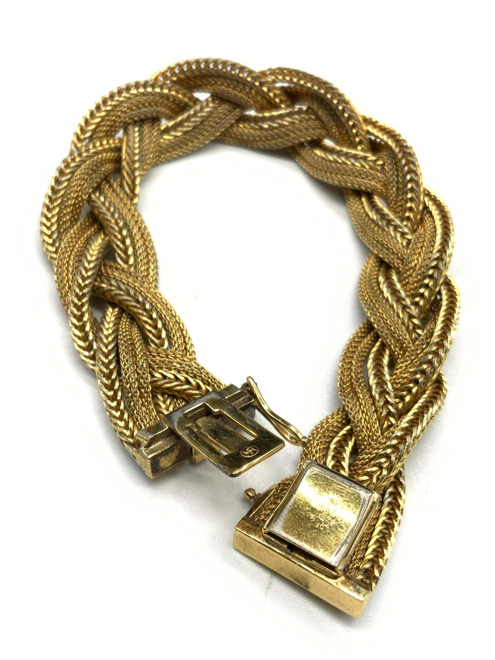 GROSSE 1963 Textured Woven Chain Bracelet, GERMANY: A textured woven chain bracelet with a box clasp closure. Safety hook adjacent to the clasp. It is signed GROSSE, 1963, made in Germany, and has a crown symbol. Bracelet length approx 7.5 inches. Some