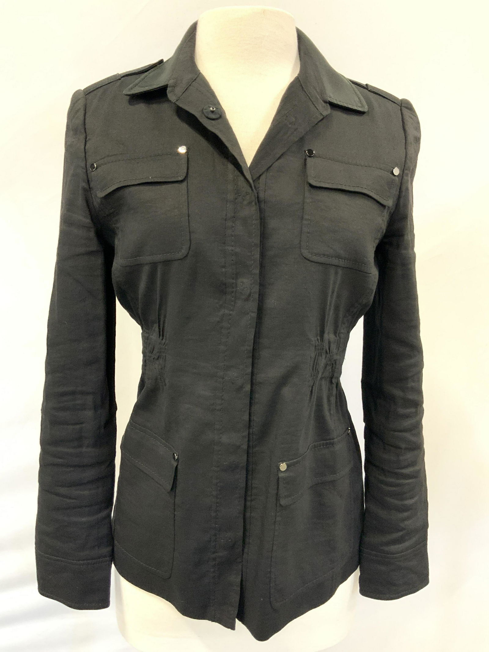 ELIE TAHRI Size 8 Black Jacket: Marked on Tag ELIE TAHARI size 8, Black toned, snap up with 4 front pockets and fitted waist line. 70% Linen, 27% Viscose 3% Elastane Norma TAHARI clothing, jacket, summer wear,ladies shirt, TAHARI de