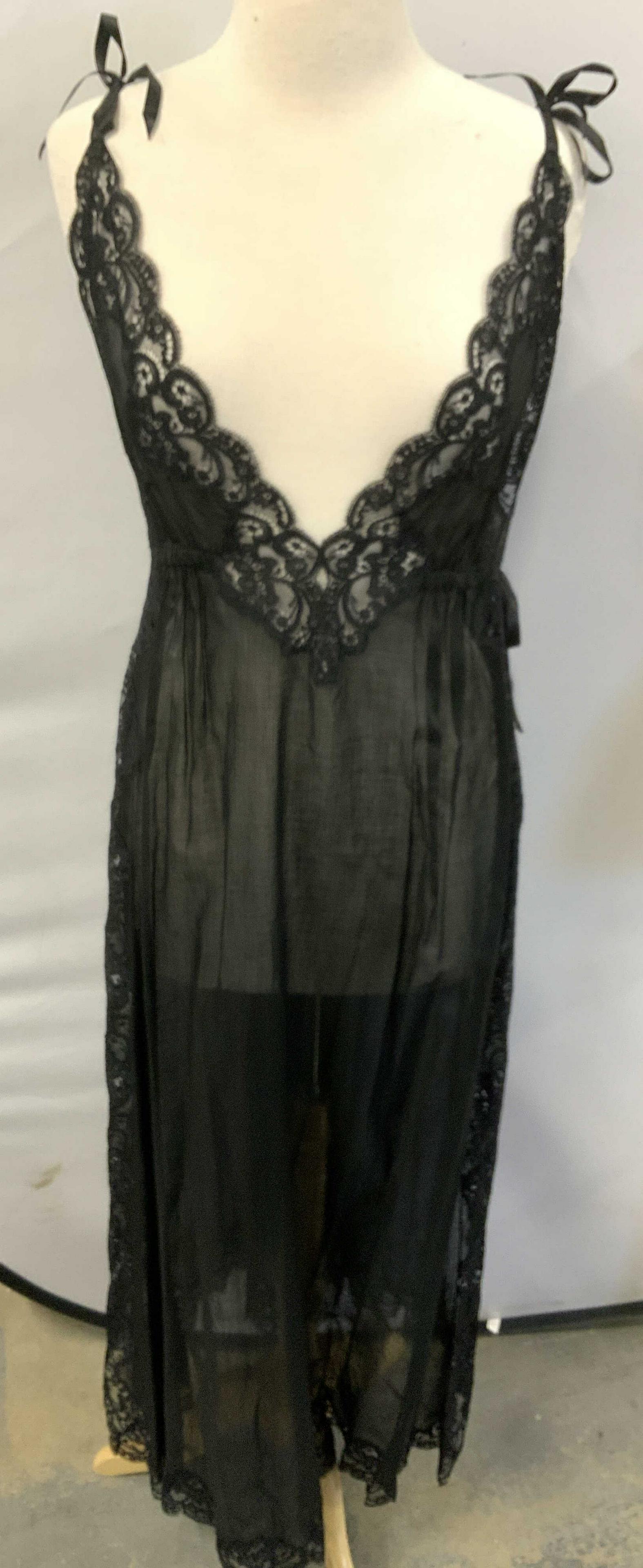 Eve Stillman Saks 5th Ave Cotton Lace Negligee: Black Sheer cotton and black lace trim long negligee nightgown, plunging V neckline and side slits up to waist which ties with a ribbon. Waist app. 30 in. Length 58 in. Ribbon shoulder ties adjustable