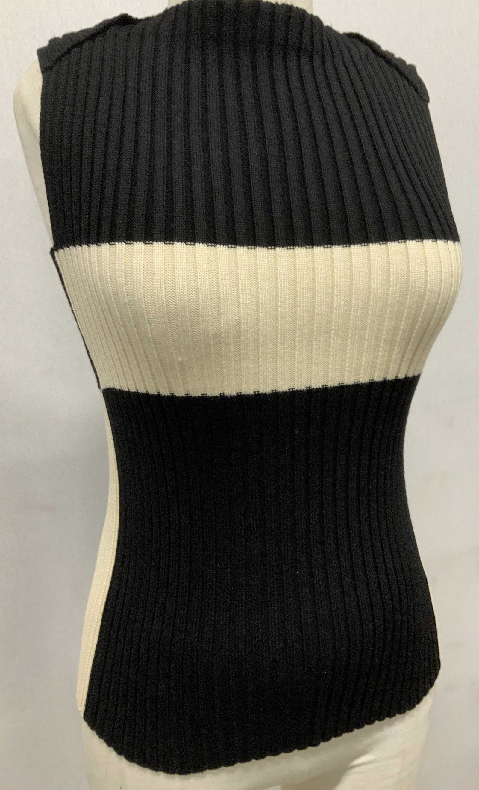 CESARE FABBRI Color Block Wool Sleeveless Sweater: Luxury Cesare Sleeveless sweater with fancy high neck collar. Black and creme wool knit. Italian Size 44 Has been kept in a dry cleaning bag stuffed with tissue paper. Ladies luxury knitwear, Cesare w