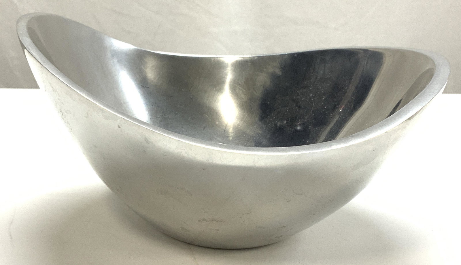 Nambe Metal Butterfly Bow: The Nambre Butterfly bowl, silver toned functional art made of sand-cast and hand-polished metal allo. Excellent heat and cold retention; will not crack, chip, or tarnish. One of Nambe's earliest and 
