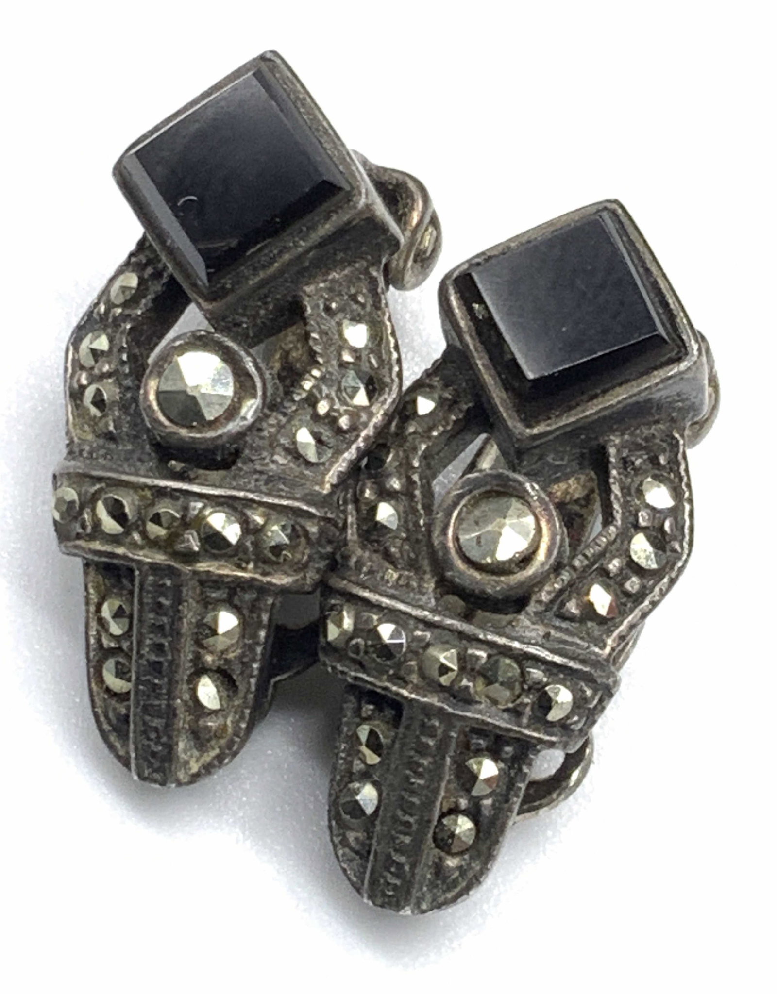 STERLING SILVER Vtg Onyx & Marcasite Clip Earrings: Sterling silver clip on earrings featuring polished onyx stone and marcasite. Clip on backings. Measures approx 1L x .25W in. Total weight .18 ozt. Signed on underside 925. Some surface wear consisten