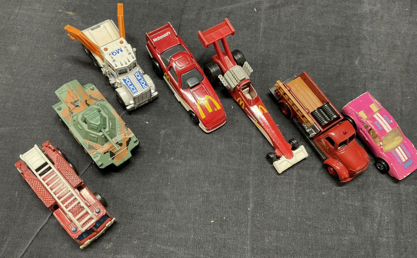 Lot 7 Hot Wheels & Matchbox Cars: Lot 7 Hot Wheels & Matchbox Cars. 3 matchbox cars, 3 hot wheel cars. 2 McDonald advertisement cars. Pieces are retro and have some significant wear to surface (see photos). Longest car measures approx