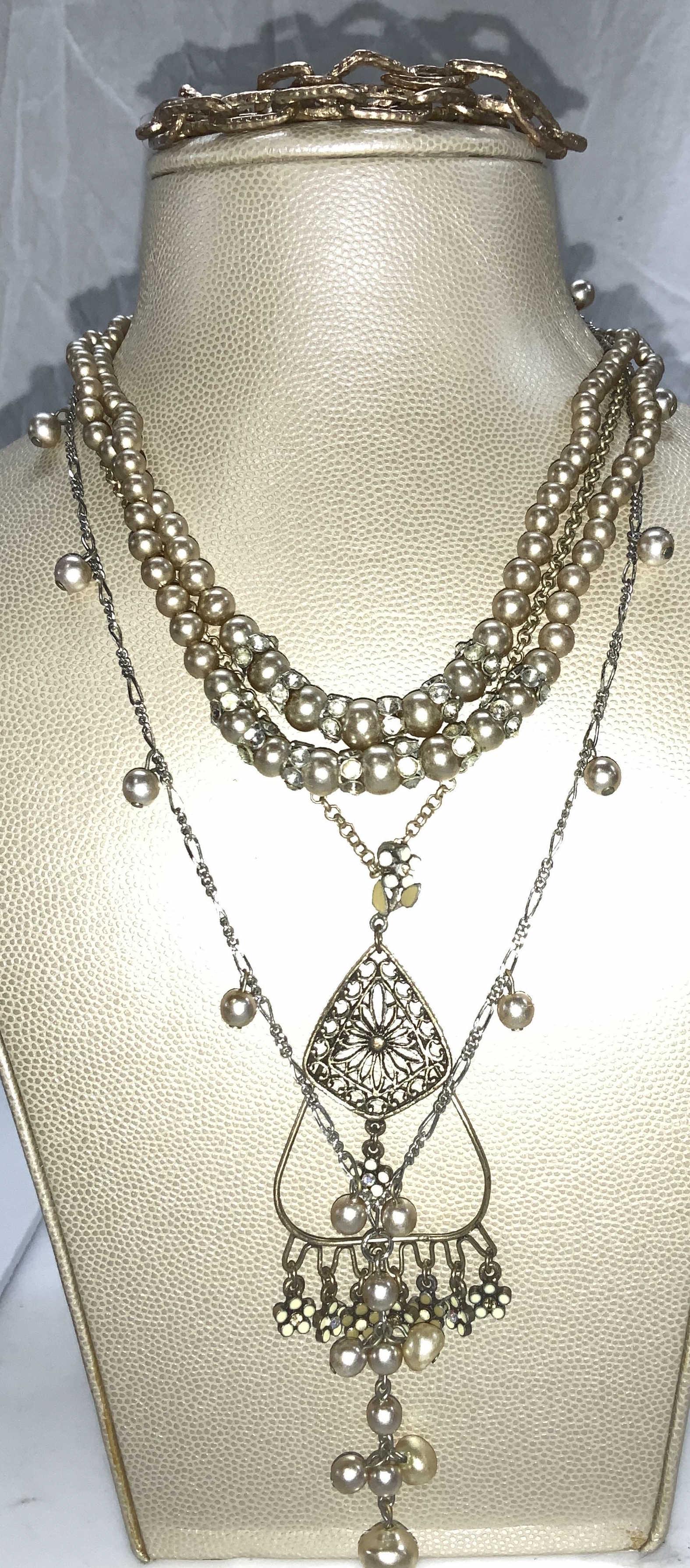 Lot4 Bronze toned Jewelry W faux pearls: Faux Pearl Coker necklace with rhinestone clasp, 12 in. Bronze toned stretch bracelet with diamond cut links, 3 in diameter. stationary faux Pearl necklace with pendant 18 in. Artisanal bronze toned I