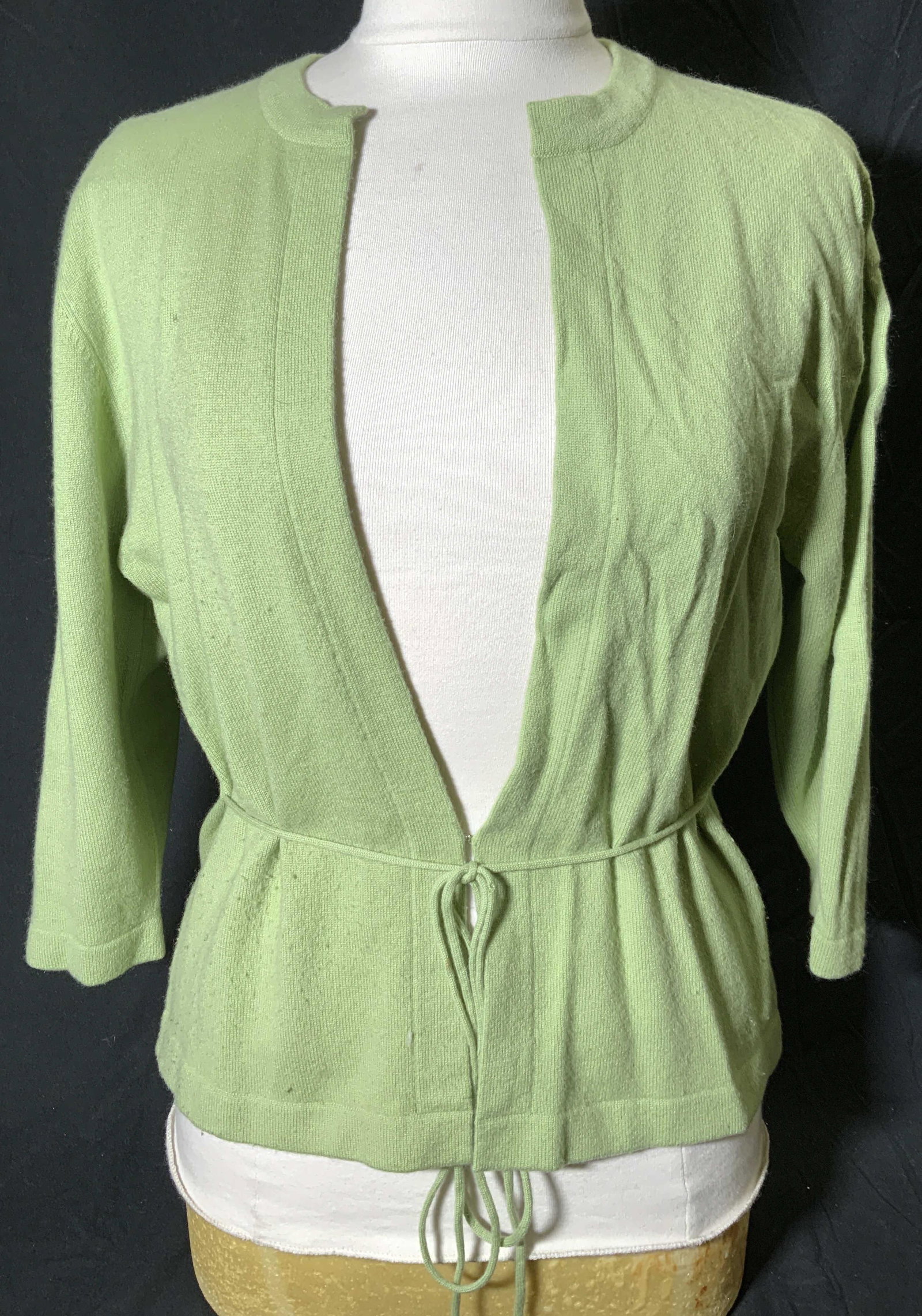AUTUMN CASHMERE Green Tie Waist Cardigan: Autumn Cashmere green cardigan sweater with tie waist and hook closure. Size XL. 100% cashmere. Small holes present. Autumn cashmere, ladies cashmere sweater, ladies cashmere cardigan, ladies designer