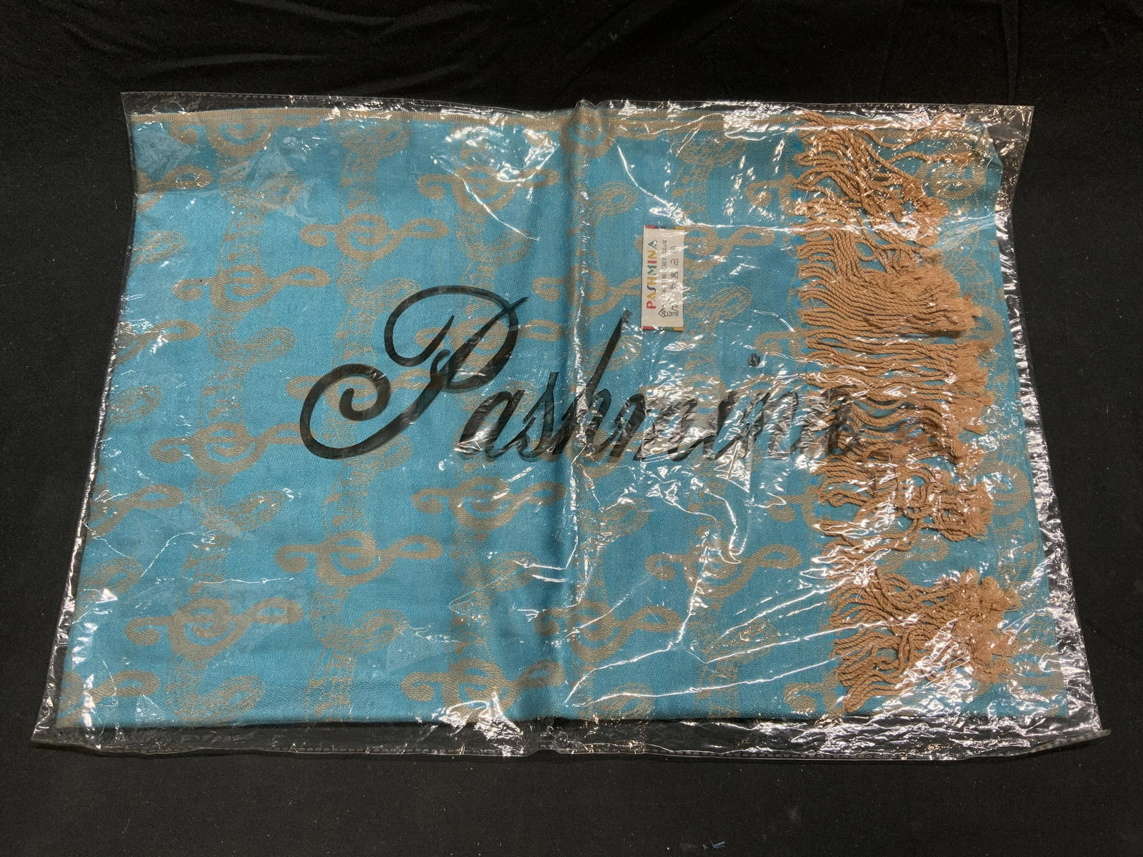 PASHMINA Blue Musical Composition Scarf NIP: Pashmina blue and beige scarf with musical composition motif. New in original package. Measures approx. 60 x 40.5 inches. Pashmina, pashmina scarf, musical composition, musical scarf, blue scarf, frin