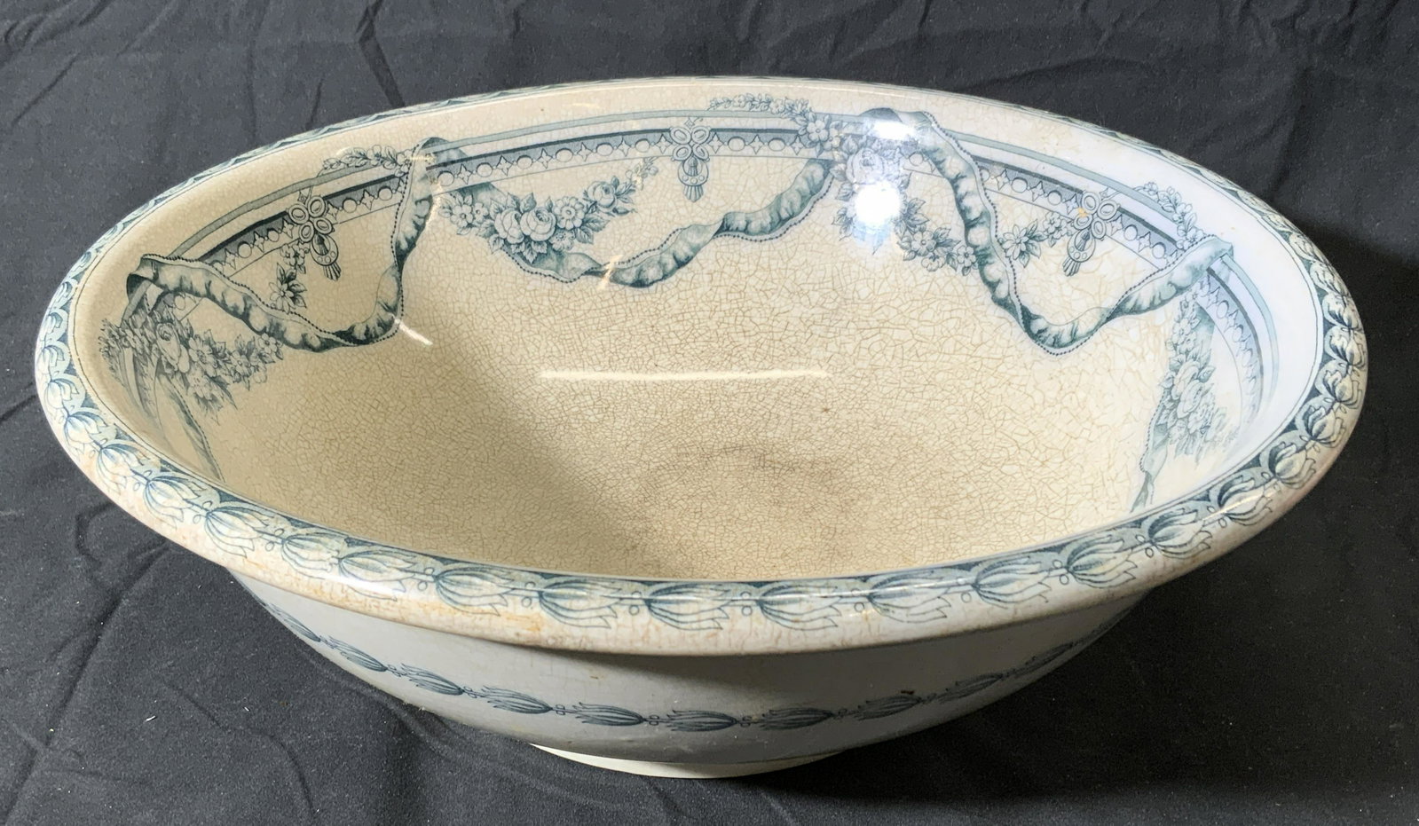 Antique VICTORIA B&H Ceramic Wash Basin: Antique Victoria B&H ceramic wash basing with floral decoration to rim. Measures approx. 14.75 inches diameter and 5 inches tall. Surface wear consistent with age and exposure, crazing. Trademarked to